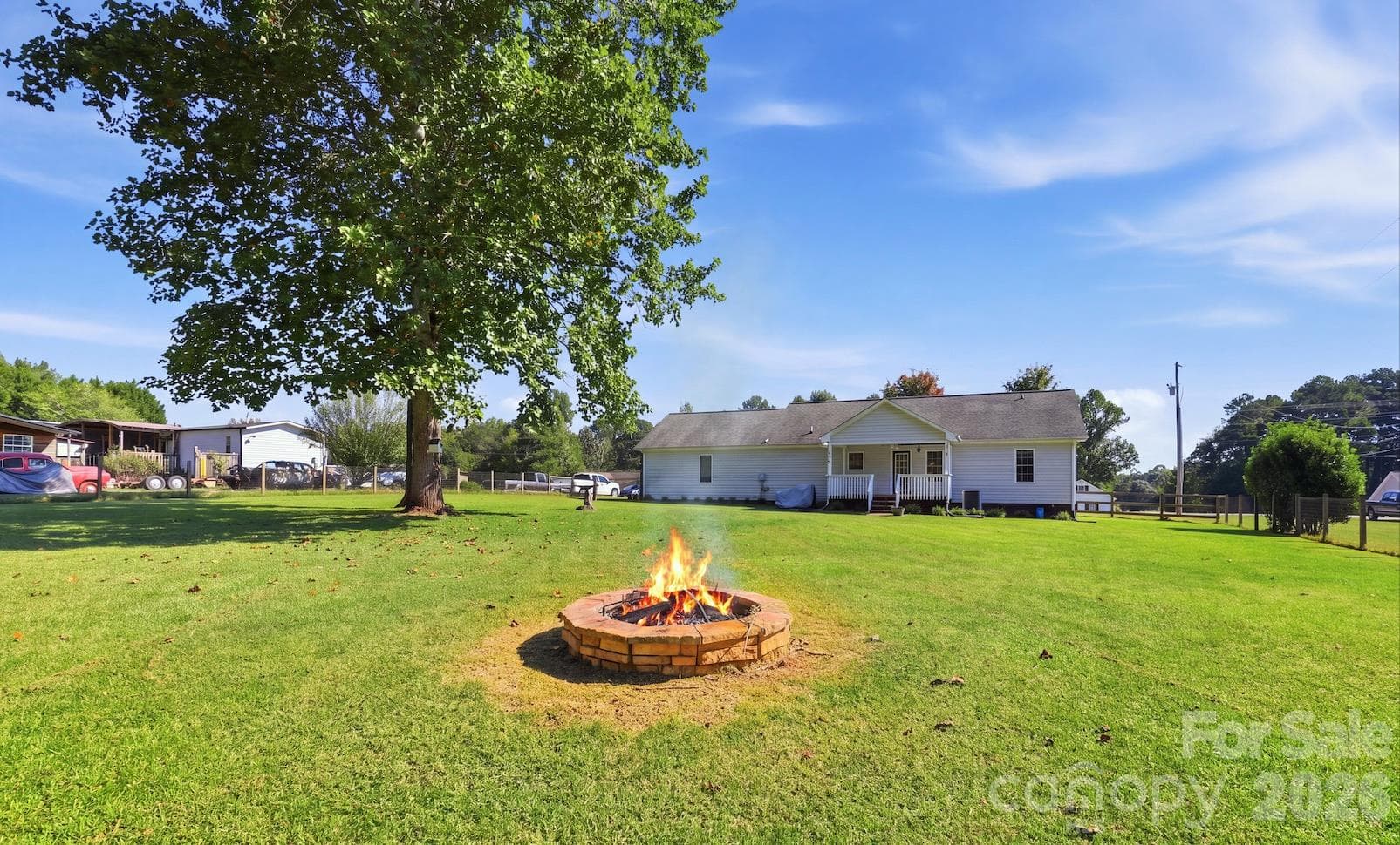 Fire in fire pit was virtually placed - 2455 Fay Jones Road, Denver