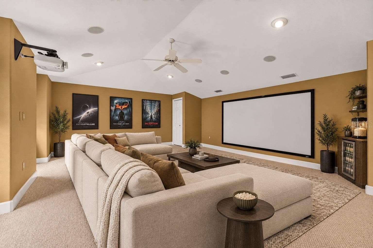 Virtually staged movie room - 1516 CANOPY OAKS BLVD, PALM HARBOR