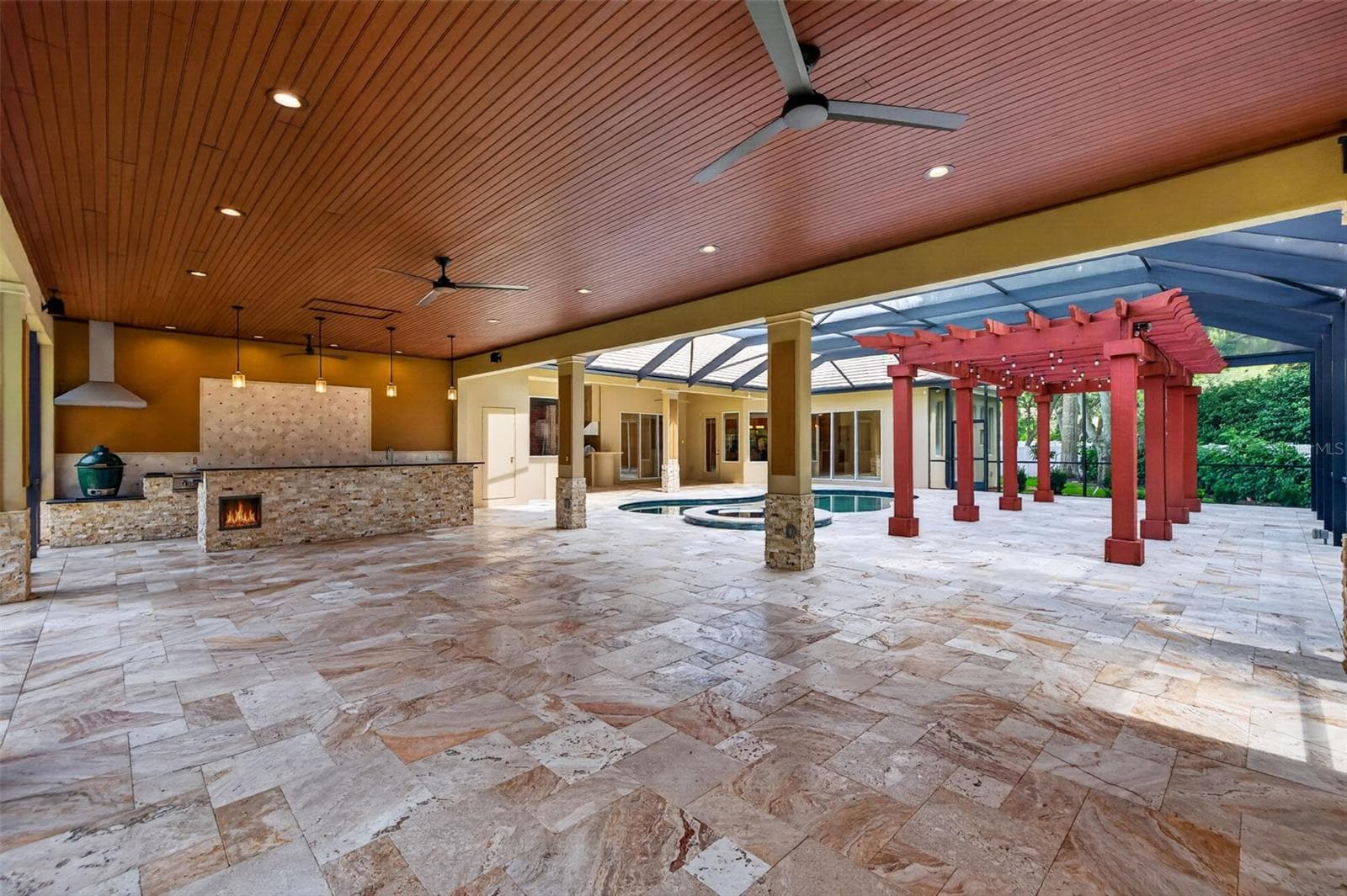 Travertine paved covered lanai - 1516 CANOPY OAKS BLVD, PALM HARBOR