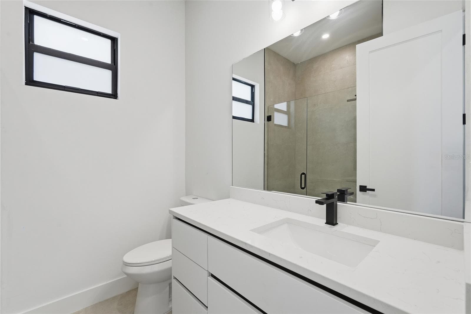 Bathroom - 2026 NW 21ST ST, CAPE CORAL