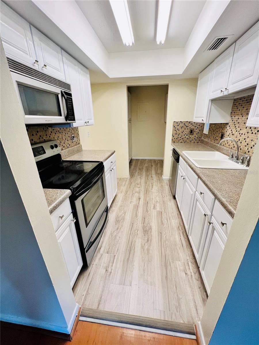 Condominium at 6057 WINDHOVER DR #E-08, ORLANDO, photo 18 of 27