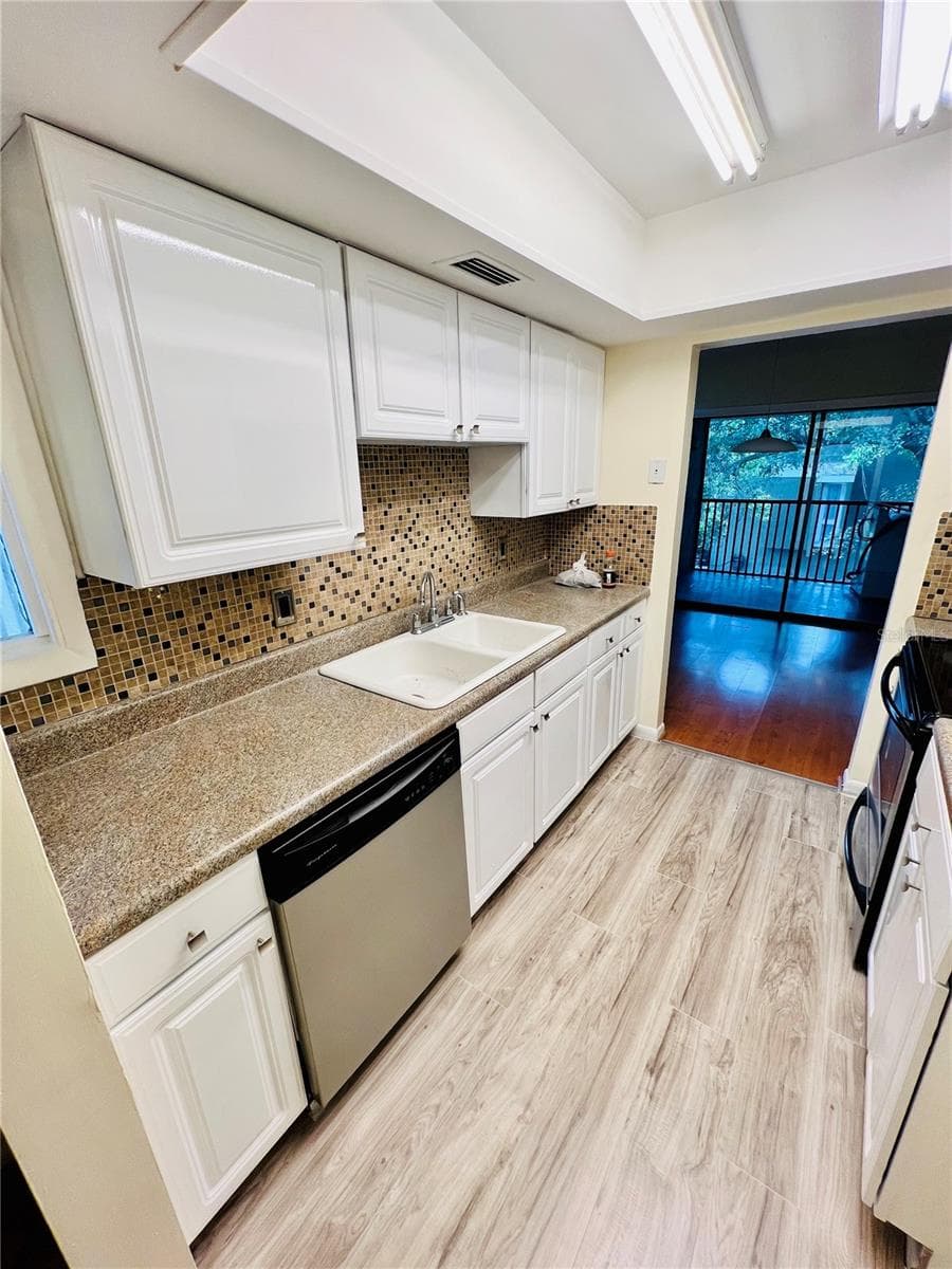 Condominium at 6057 WINDHOVER DR #E-08, ORLANDO, photo 19 of 27