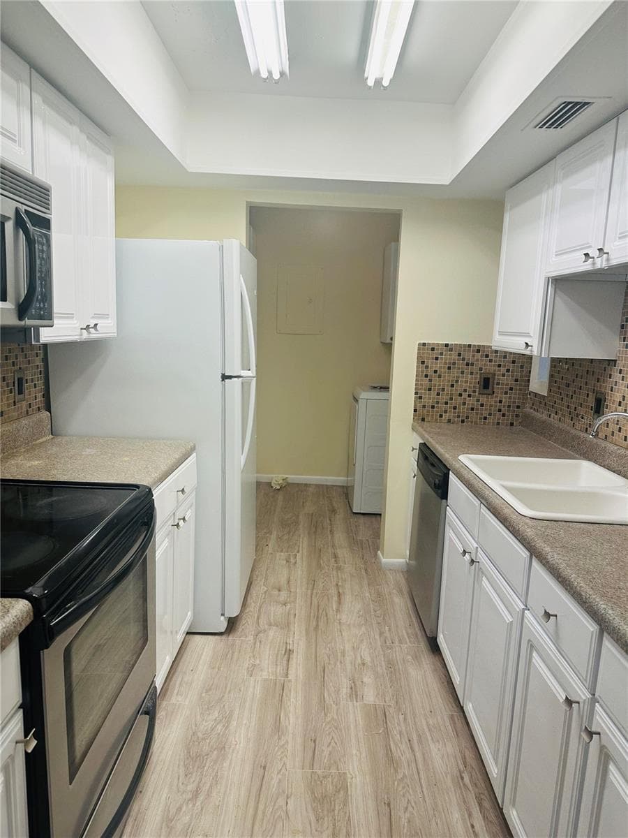 Condominium at 6057 WINDHOVER DR #E-08, ORLANDO, photo 20 of 27