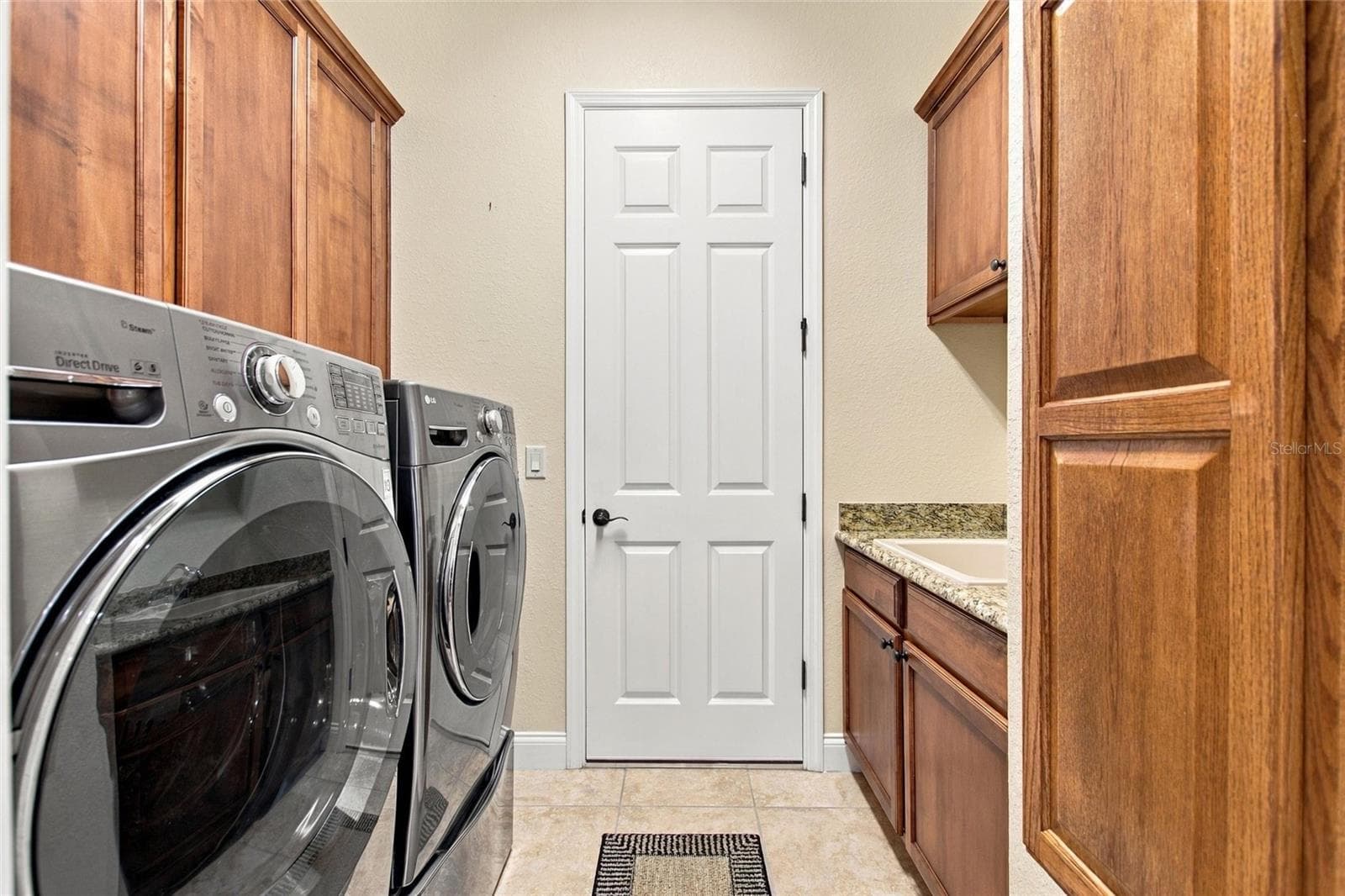 Laundry room off of kitchen - 335 CRUISERS DR, POLK CITY