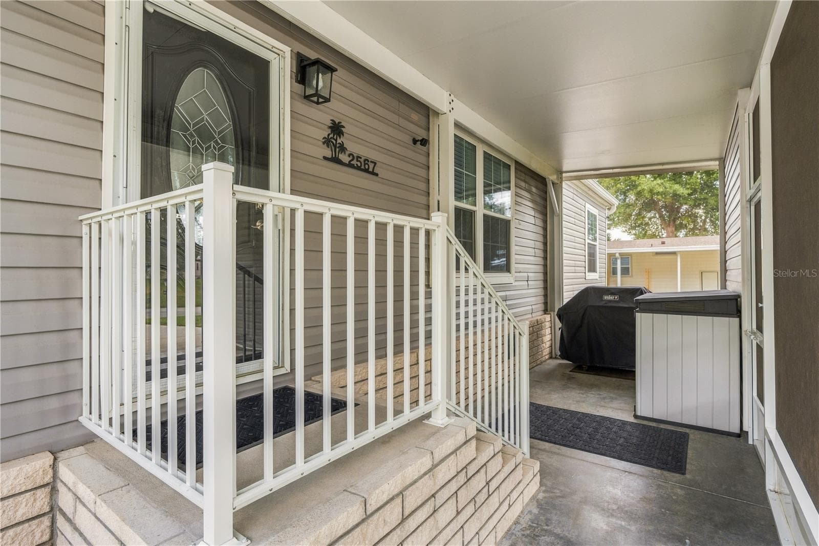Extra Screen Lanai on Front of Home - 2567 CAYMAN CIR #R25, ZELLWOOD