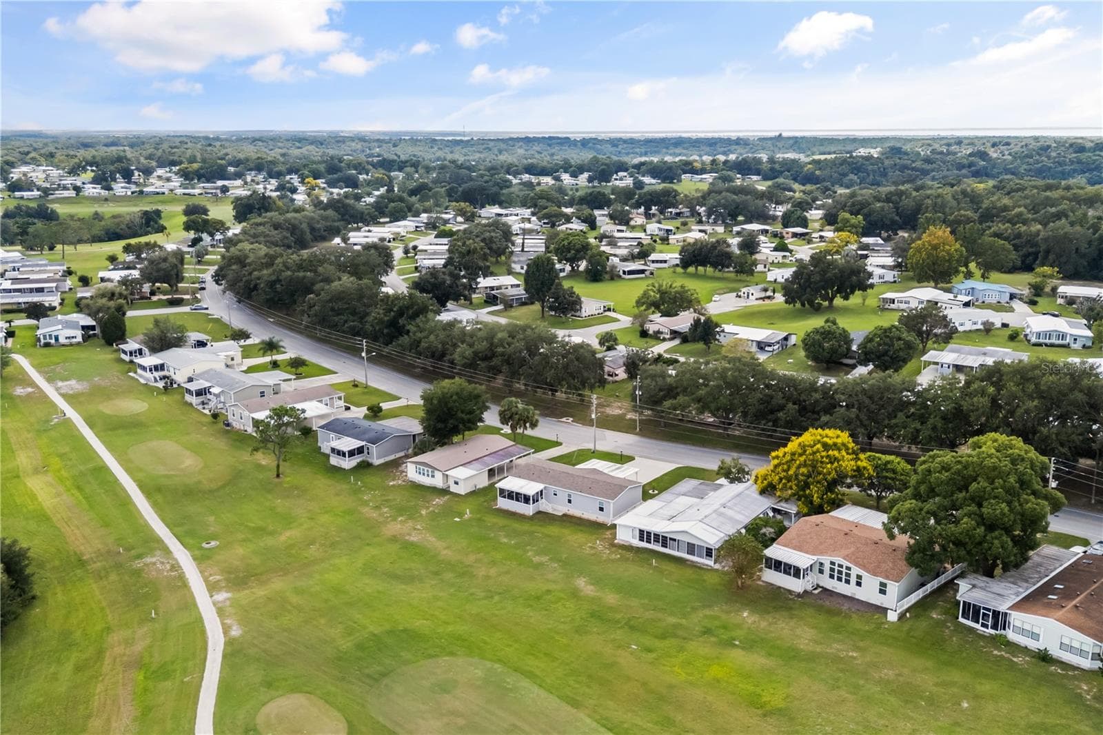 Home overlooks the 18th Green. - 2567 CAYMAN CIR #R25, ZELLWOOD