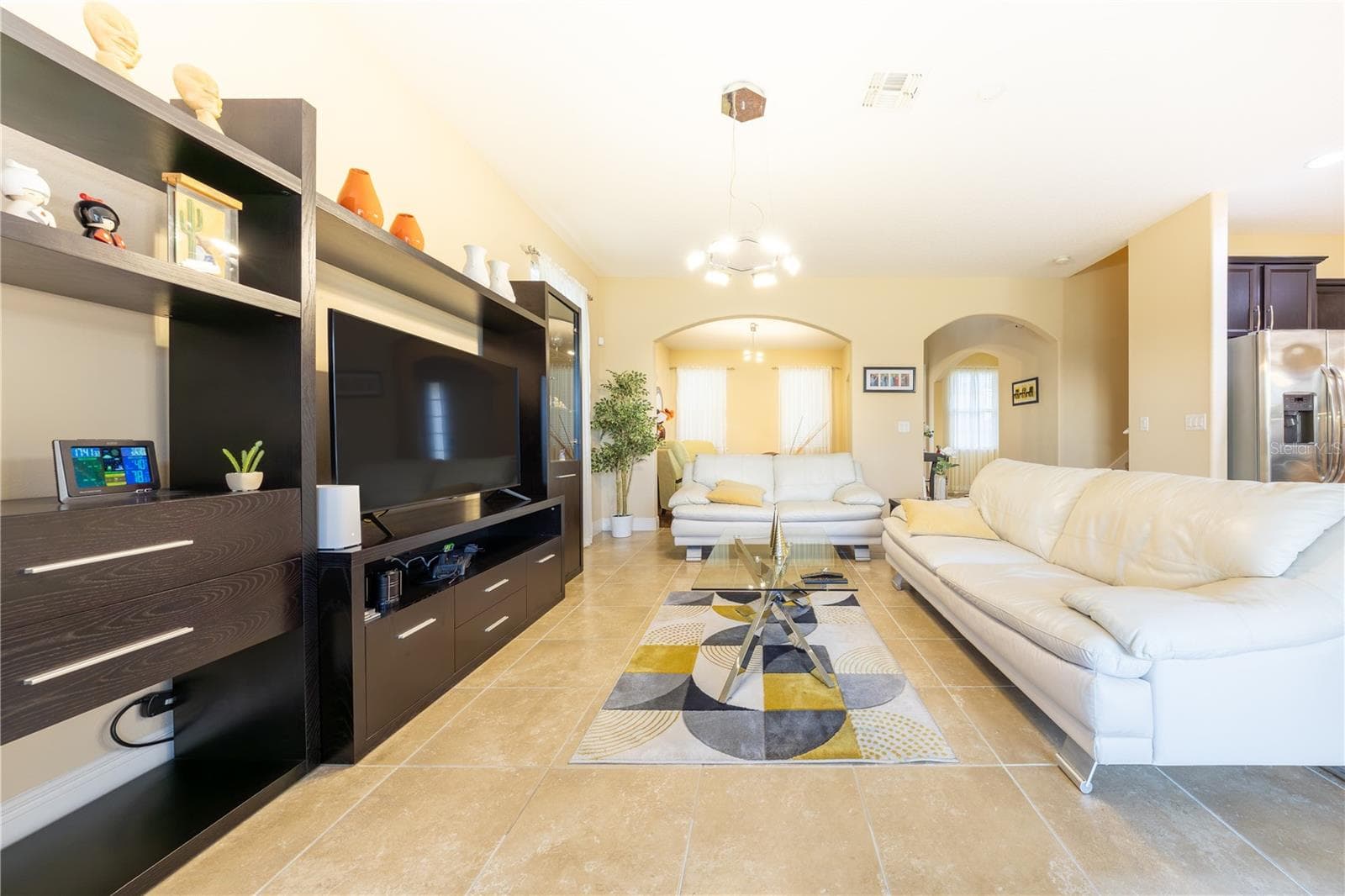 Living room open to the dining area - 3048 BOATING BLVD, KISSIMMEE
