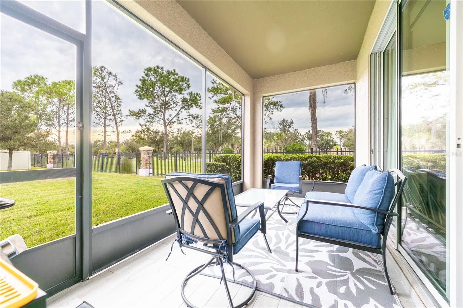 Covered screened lanai overlooking the spacious backyard - 3048 BOATING BLVD, KISSIMMEE