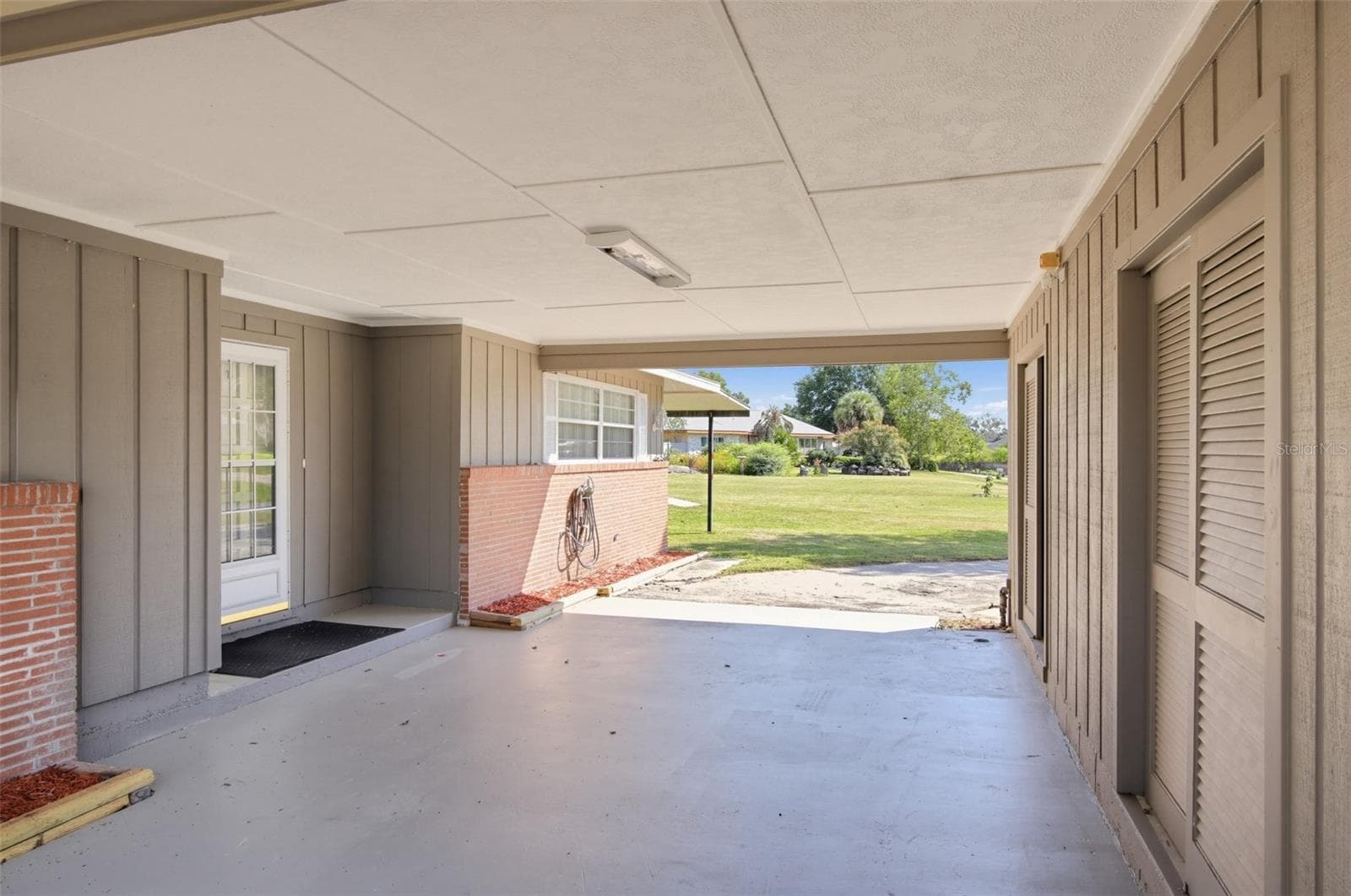 Carport and entrance - 8065 SW 100TH LANE RD, OCALA