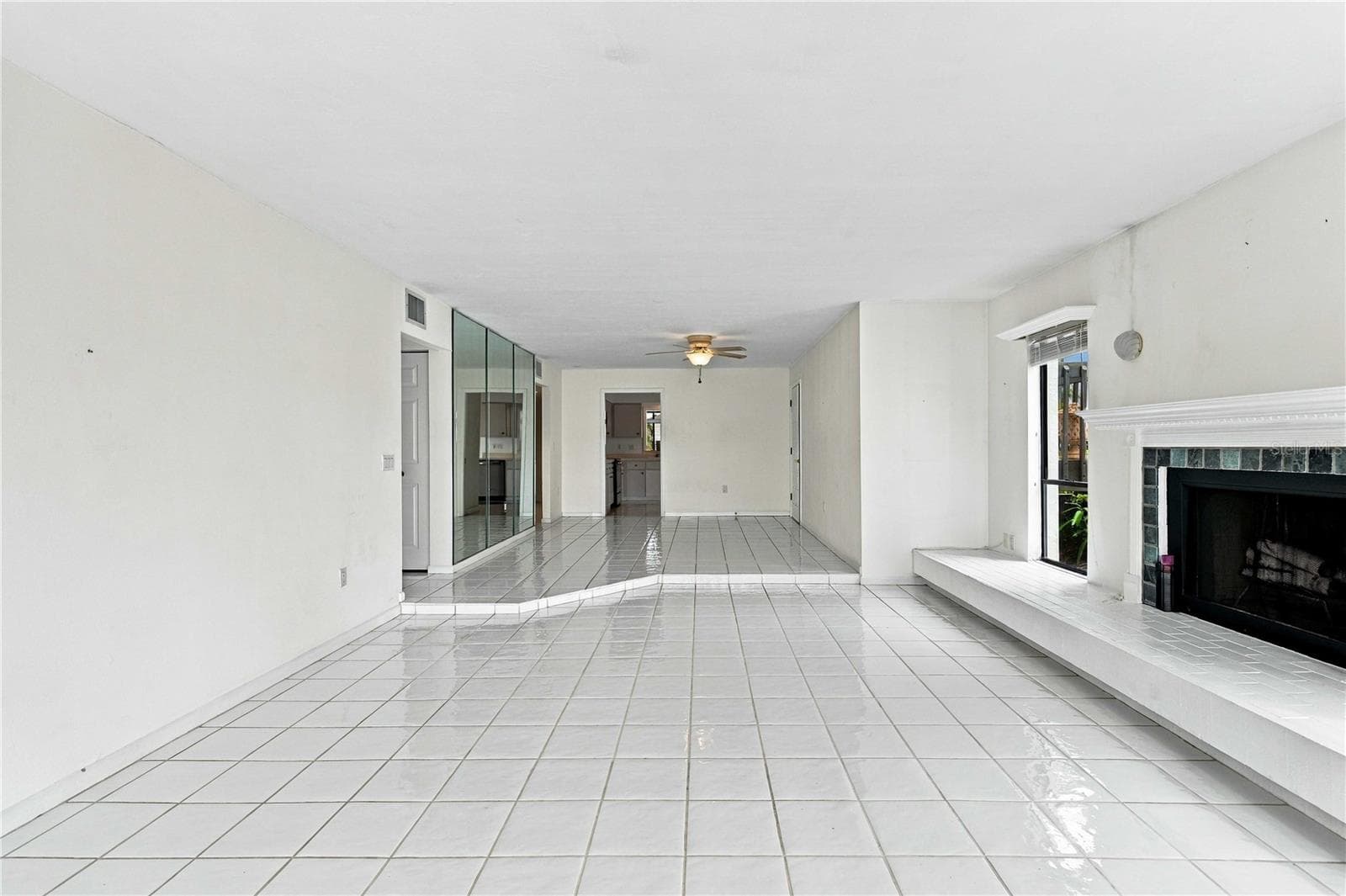 Living with wood burning fireplace - 8734 54TH AVE W #8734, BRADENTON