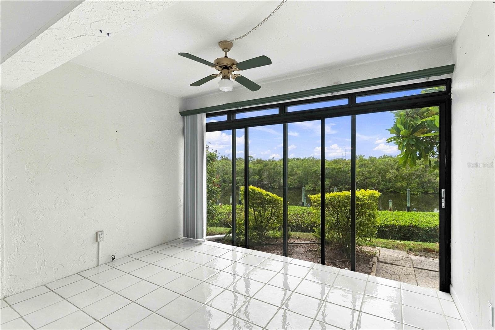 Living room outside view - 8734 54TH AVE W #8734, BRADENTON