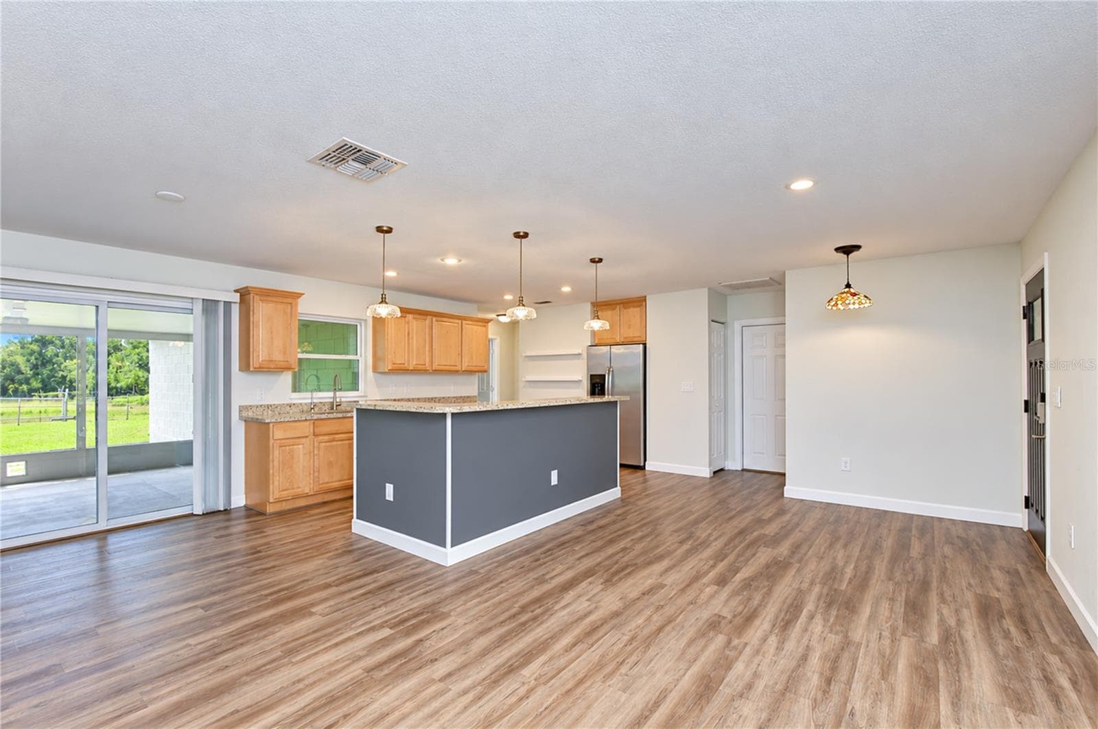 Dining table spacious with sliders! - 3712 GALLAGHER RD, PLANT CITY