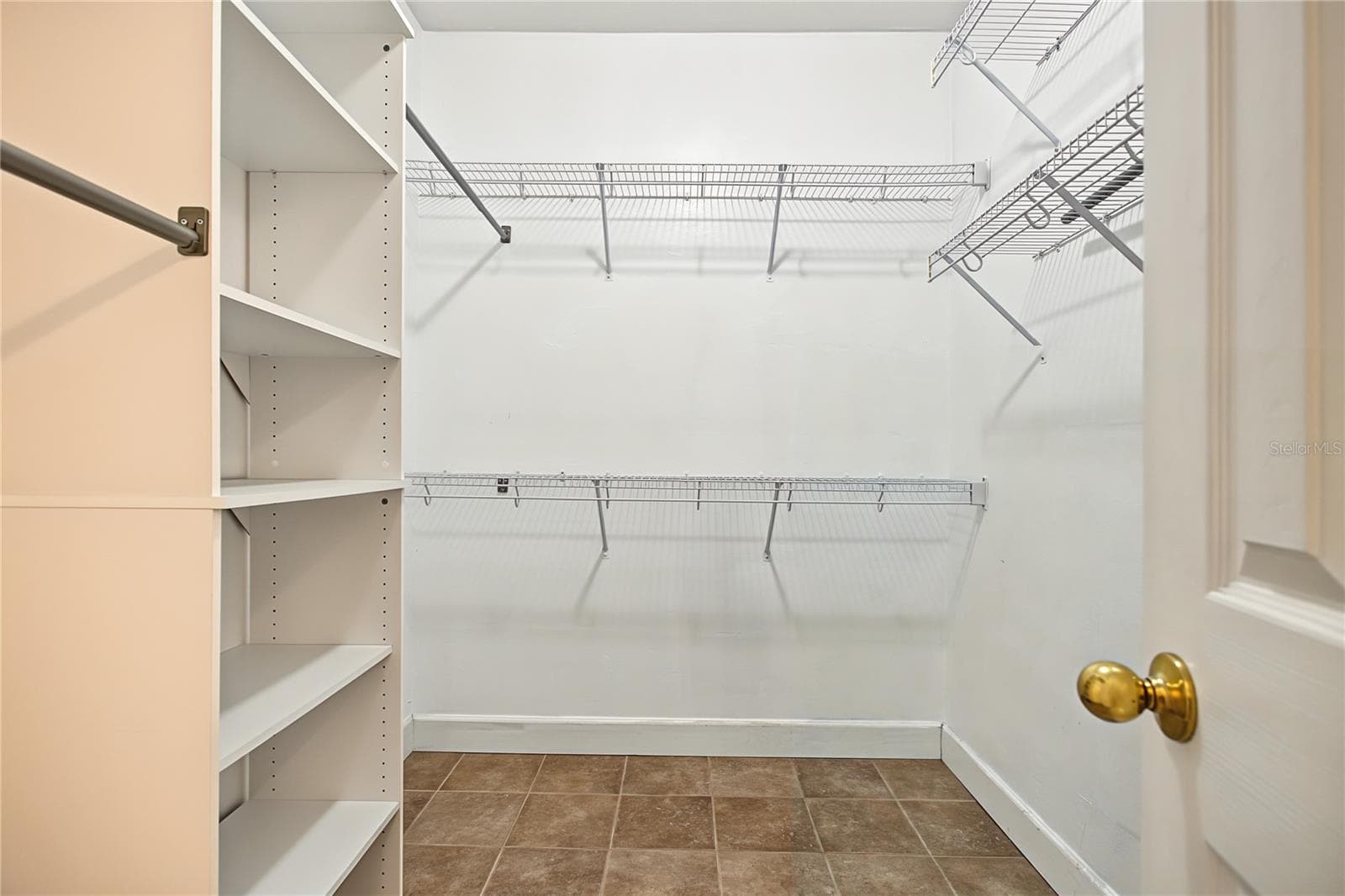 Primary walk in closet - 23830 NW 182ND PL, HIGH SPRINGS
