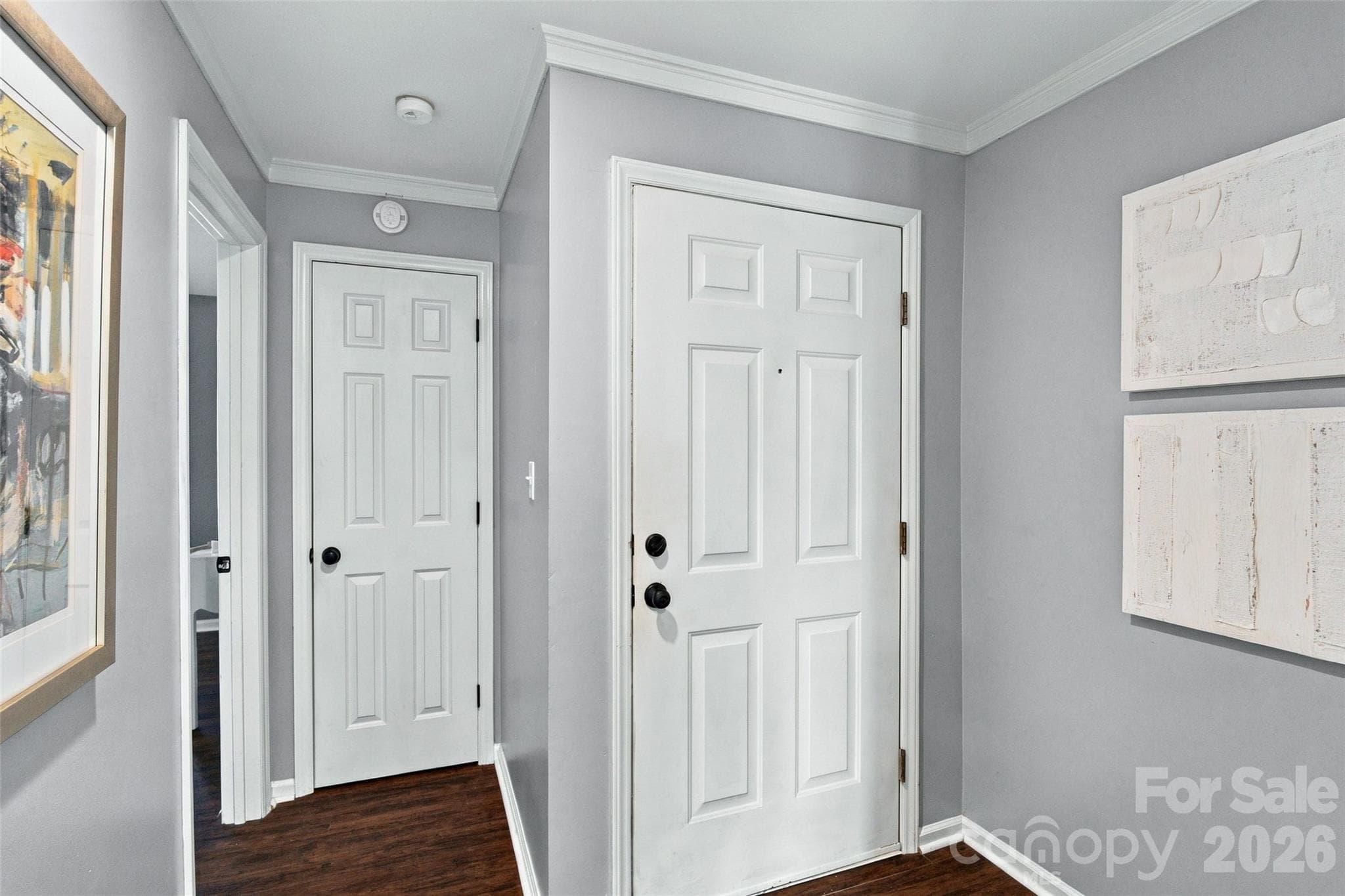 Entry foyer with crown molding and neutral finishes - 762 Marsh Road, Charlotte