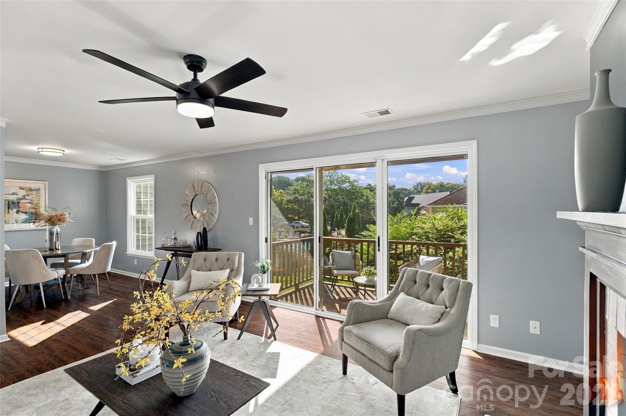 Open living and dining spaces create an easy, connected layout - 762 Marsh Road, Charlotte