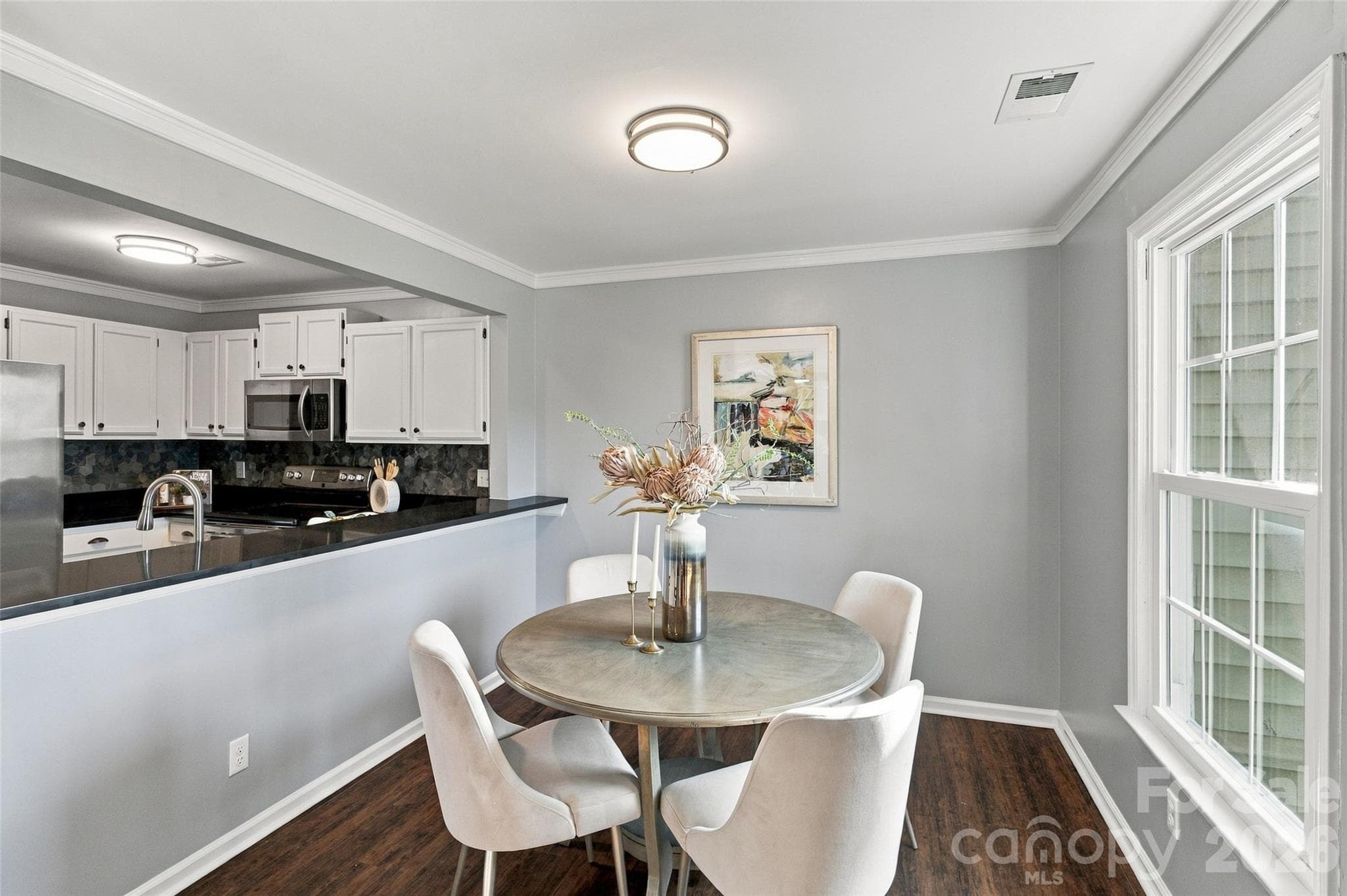 Dining area opens to the kitchen and main living space - 762 Marsh Road, Charlotte