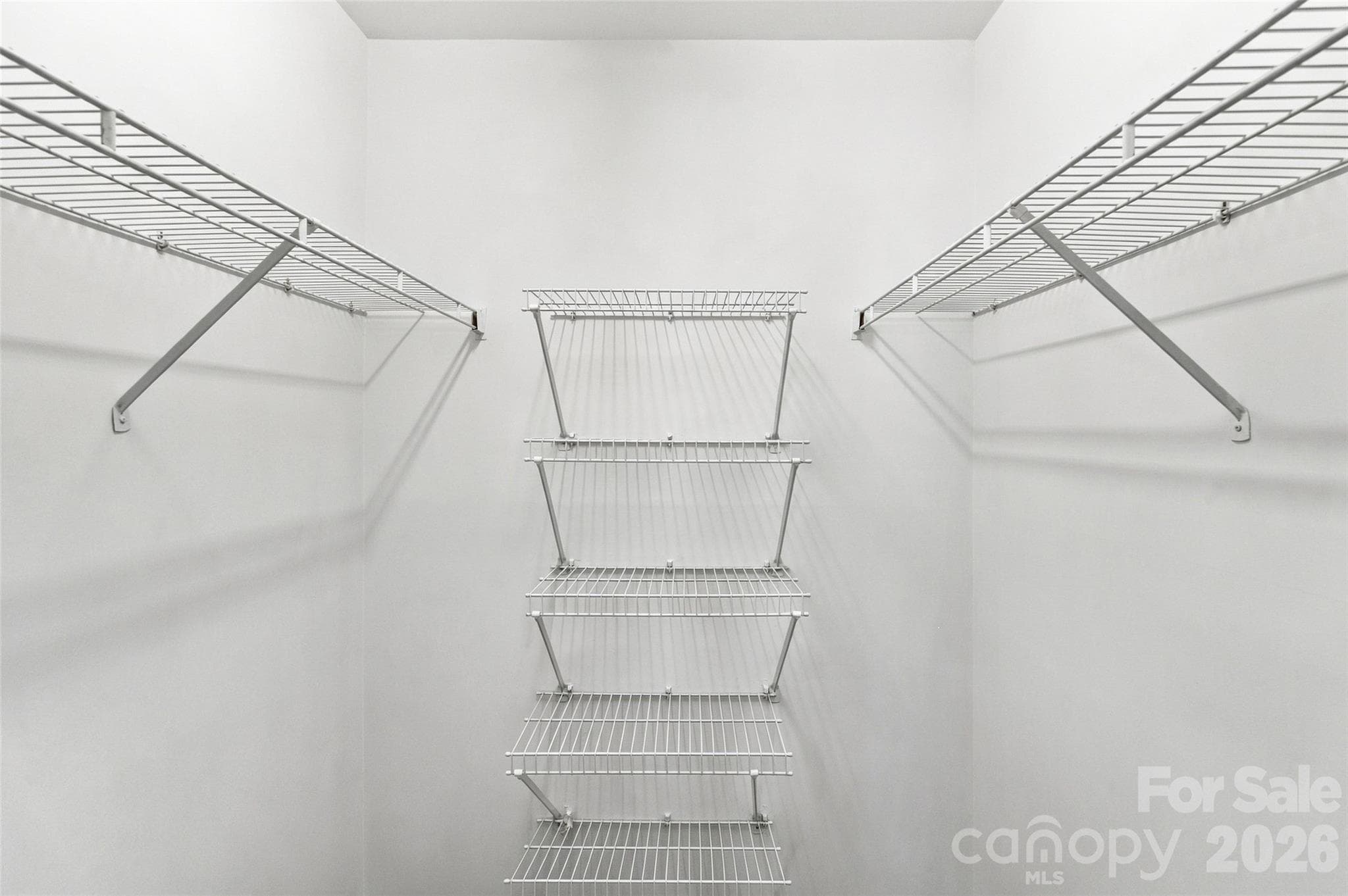 Generously sized walk-in closet with built-in shelving - 762 Marsh Road, Charlotte