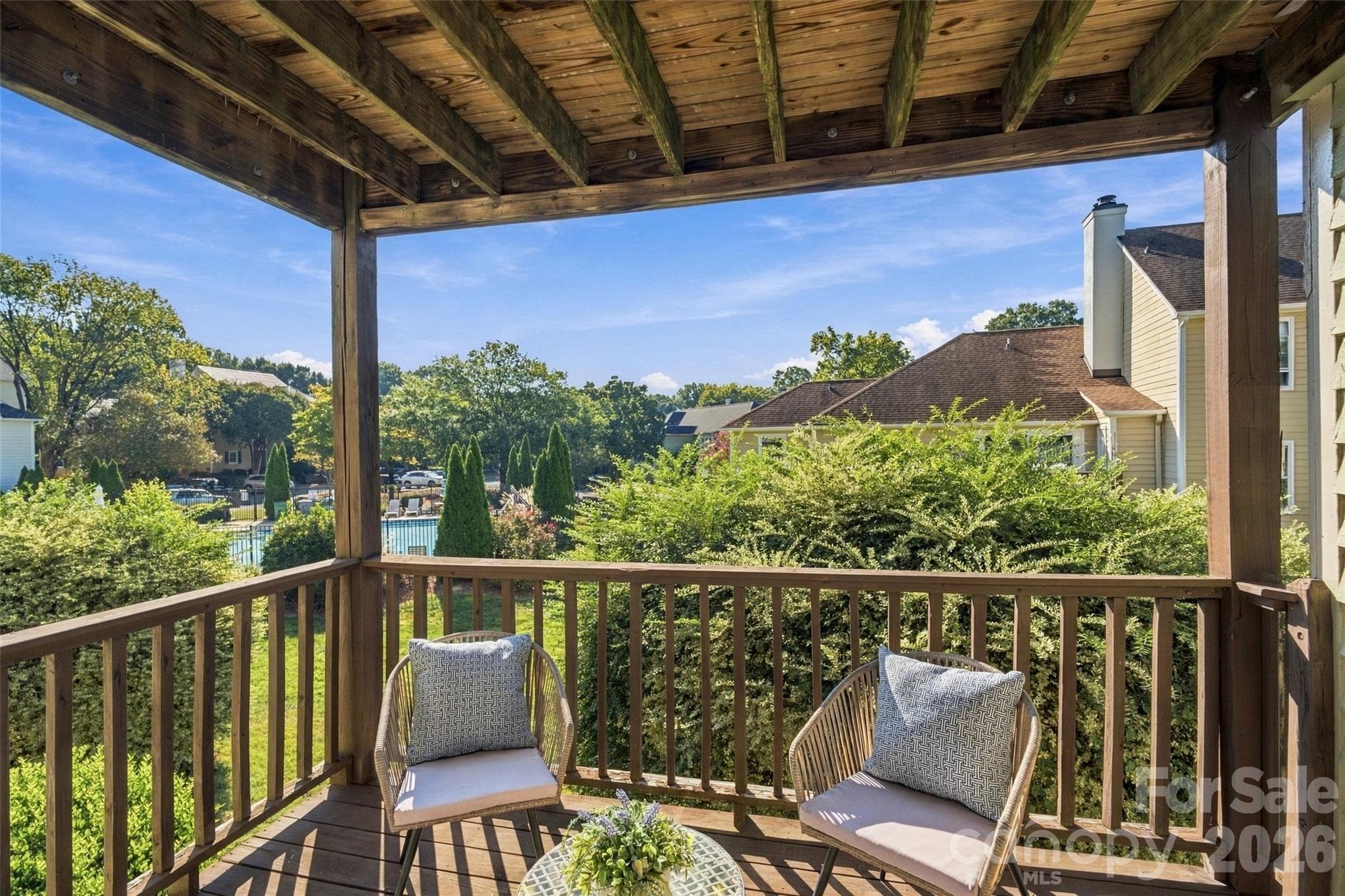 Private covered balcony extends the living space outdoors - 762 Marsh Road, Charlotte