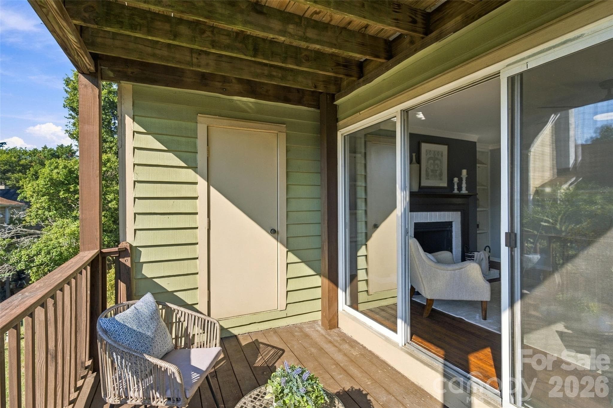 Private covered balcony extends the living space outdoors - 762 Marsh Road, Charlotte