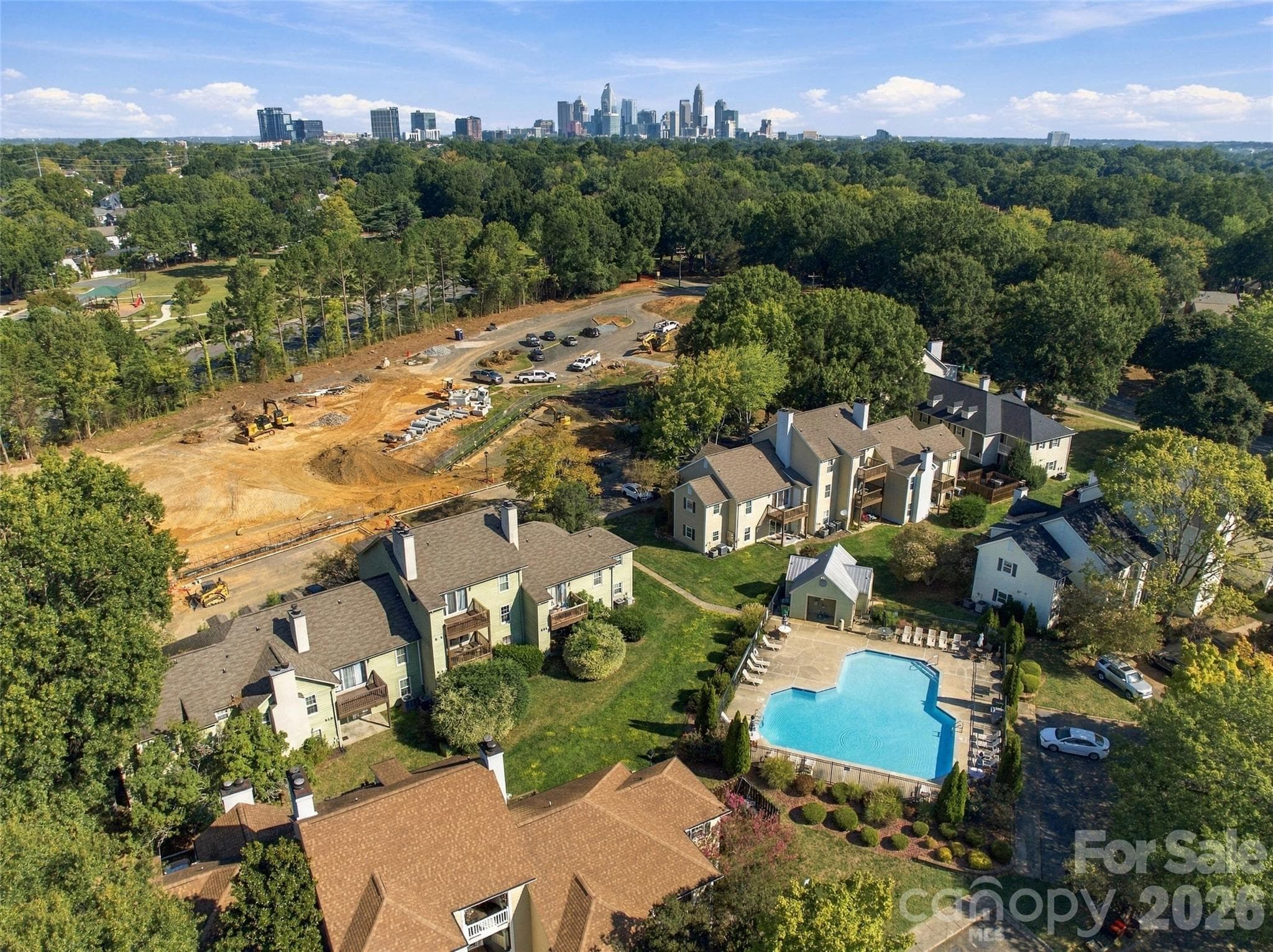 Community pool with plenty of surrounding deck space for relaxing and enjoying sunny days - 762 Marsh Road, Charlotte