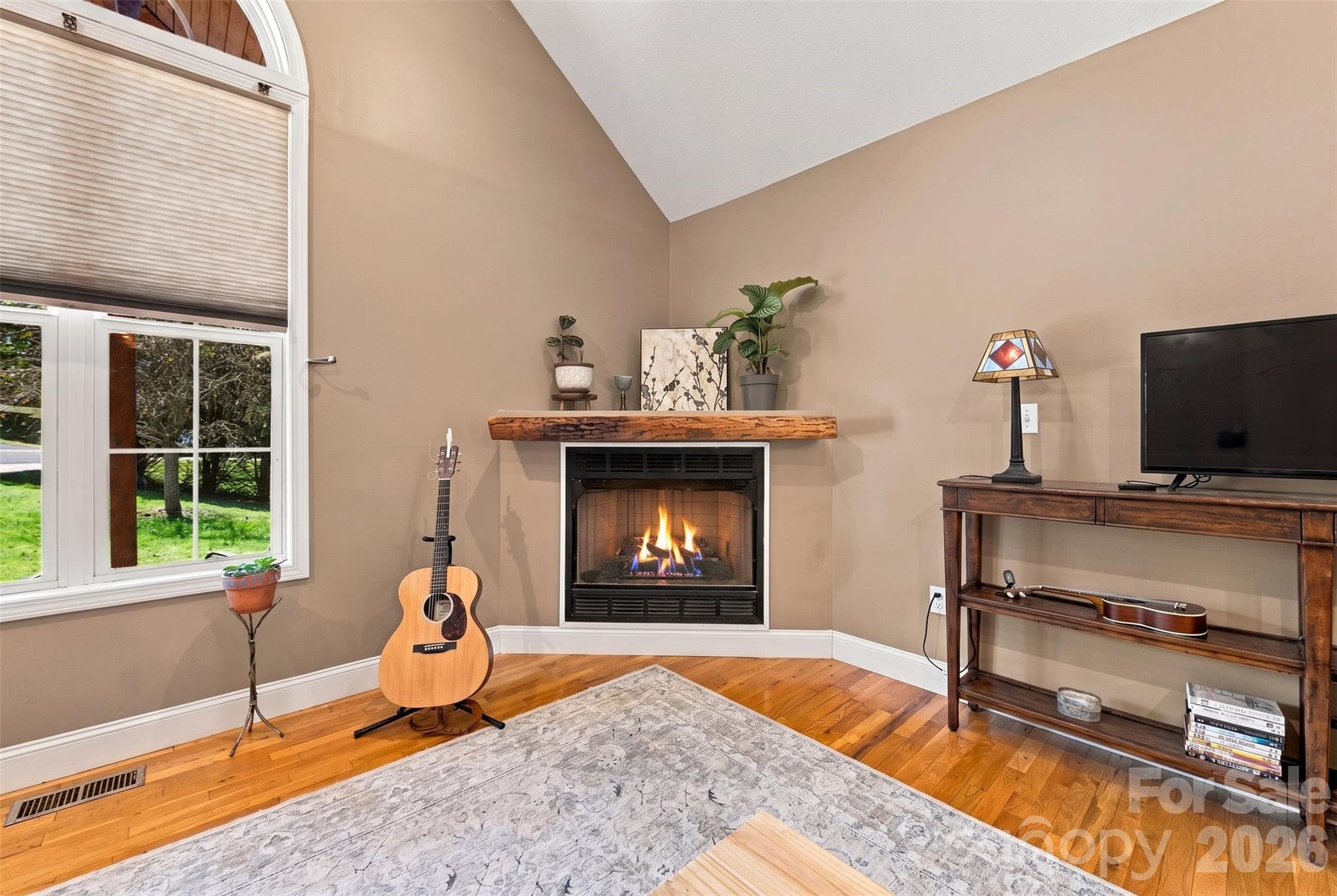 Fireplace with gas logs. - 8 Maltese Lane, Weaverville