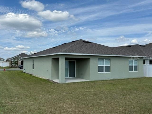 Side Elevation- Looking NE - 3818 DIVING DOVE LN, BARTOW