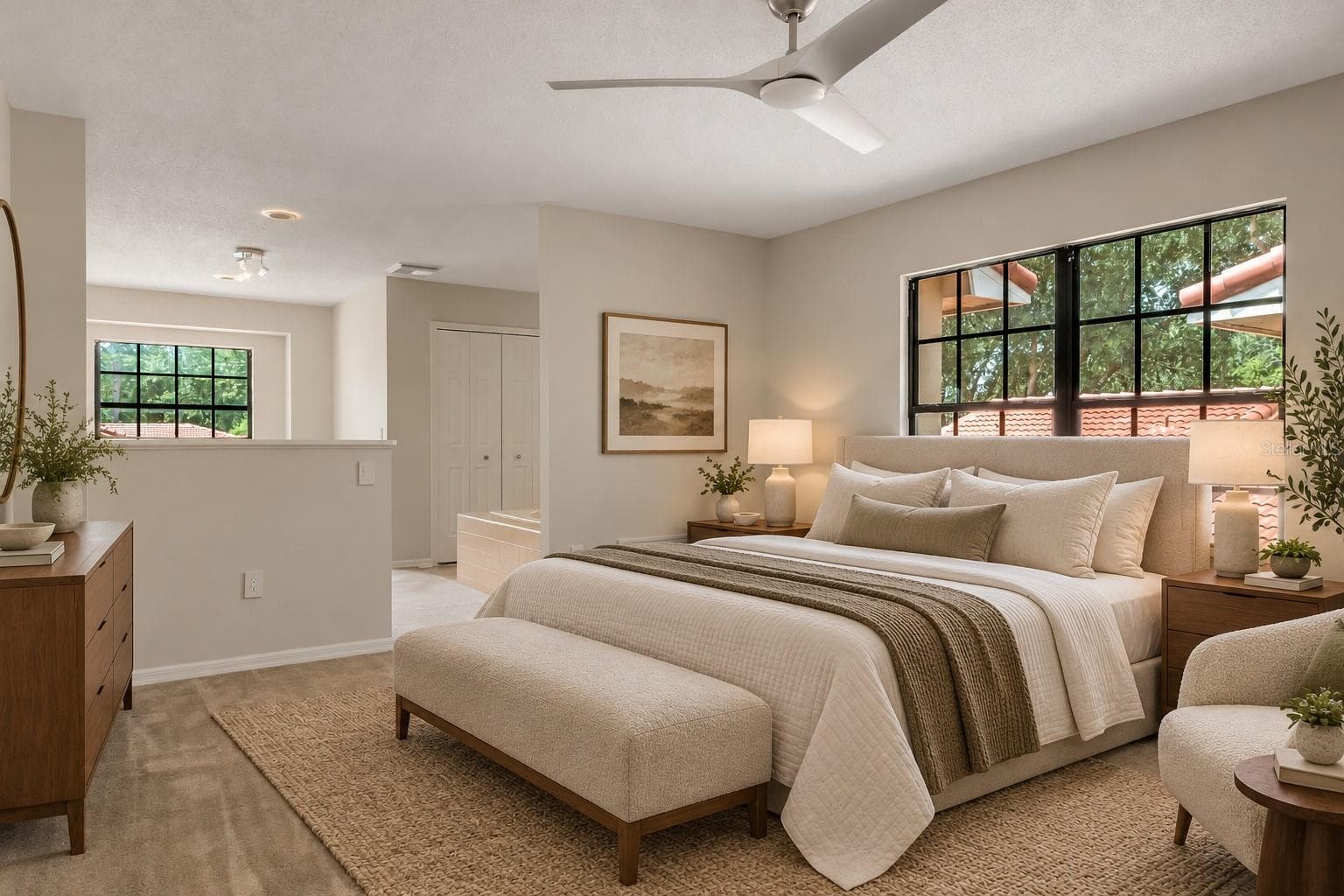 Spacious primary bedroom with room for additional seating - 8235 AMBROSE COVE WAY, ORLANDO