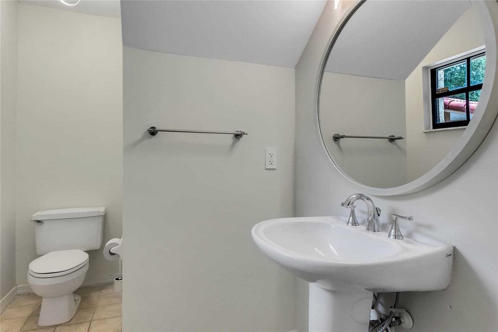 Guest half bathroom downstairs. - 8235 AMBROSE COVE WAY, ORLANDO