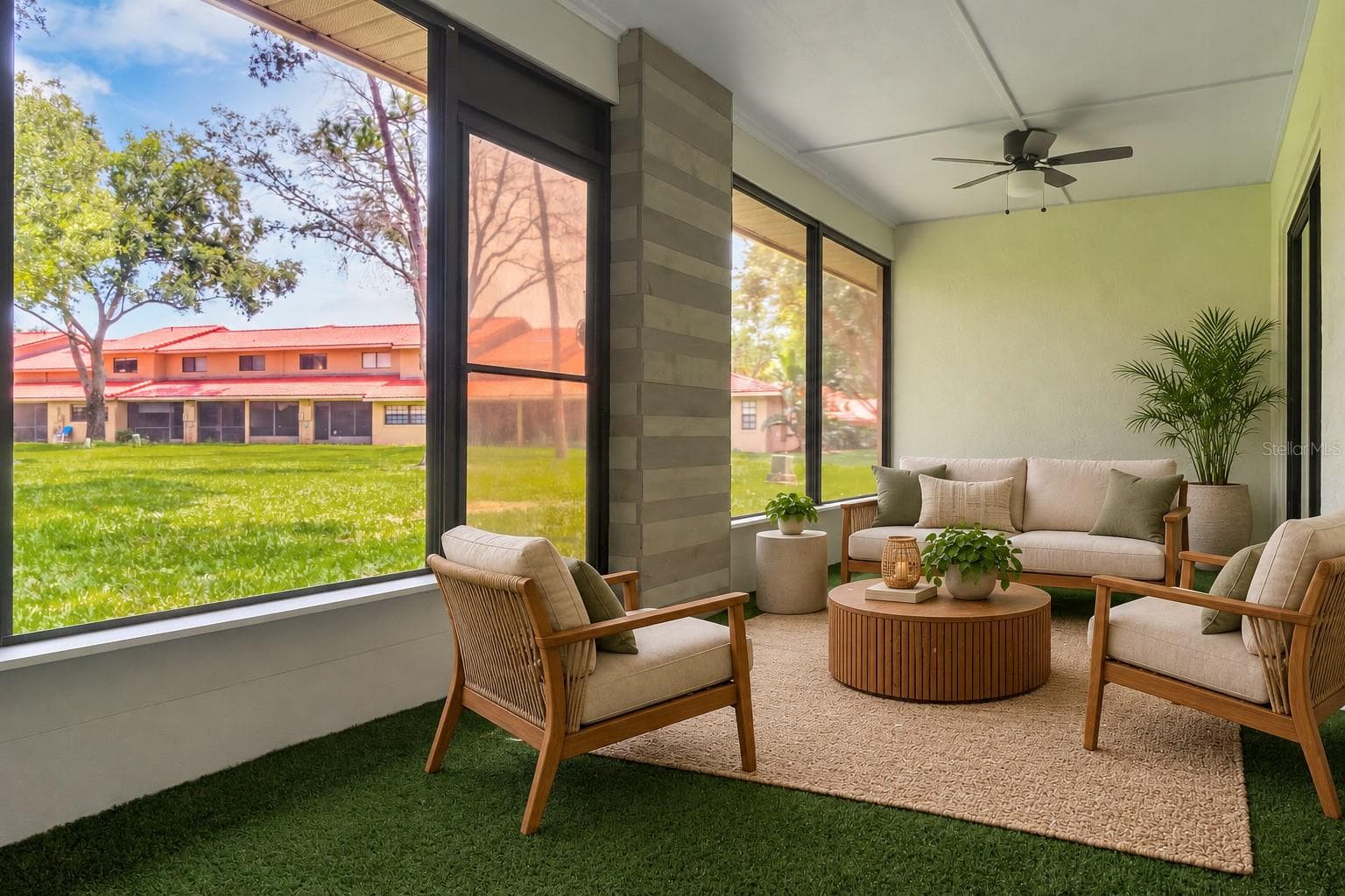 Sunroom with plenty of sunlight overlooking the green space. - 8235 AMBROSE COVE WAY, ORLANDO