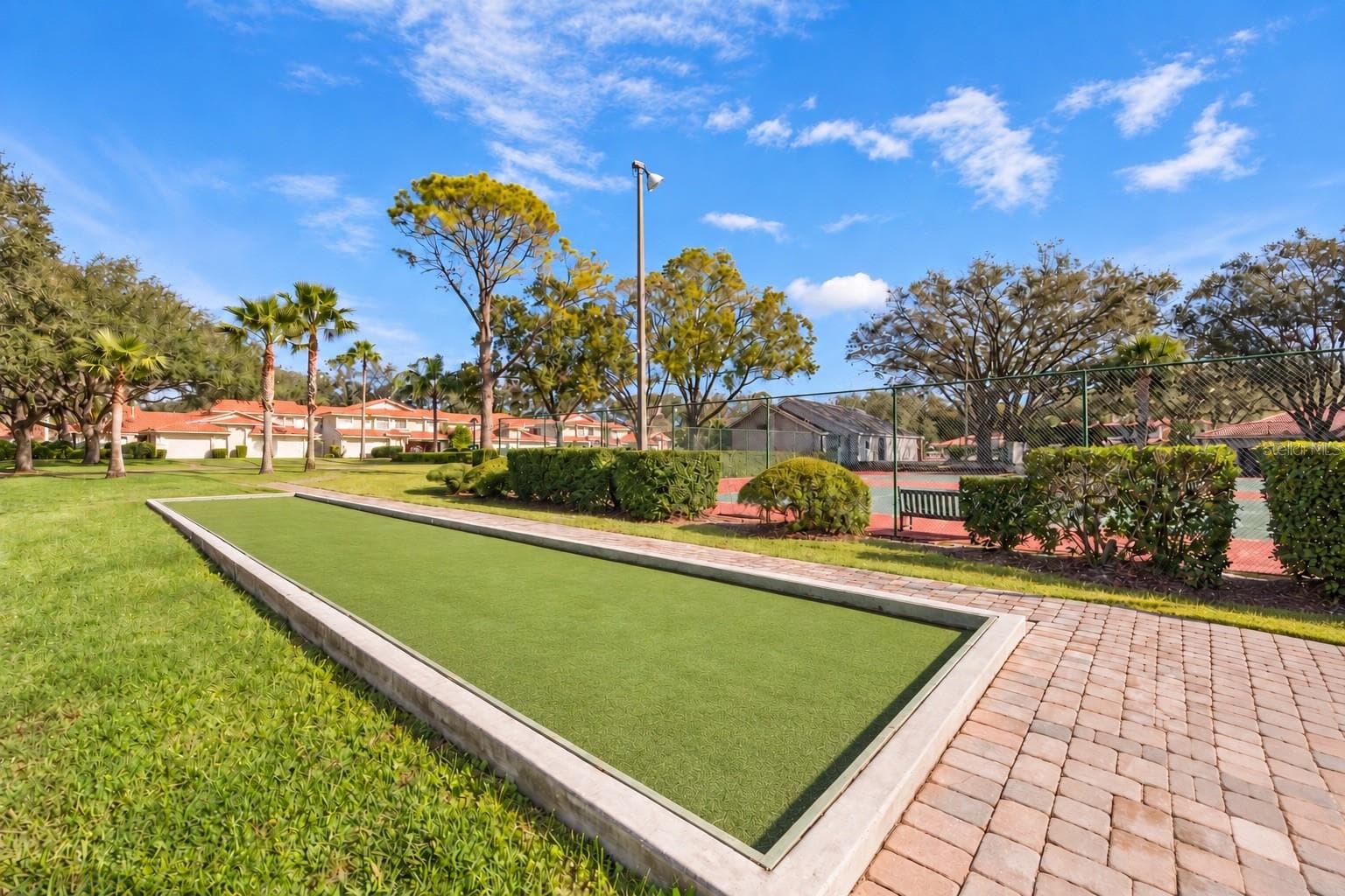 On-site bocce court adds another option for outdoor recreation. - 8235 AMBROSE COVE WAY, ORLANDO