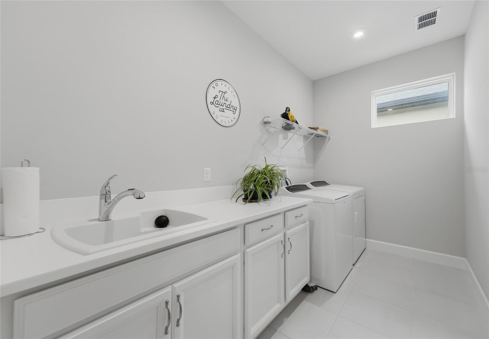 Inside Laundry room w/mop sink and lots of space - 1334 ZEEK RIDGE ST, CLERMONT