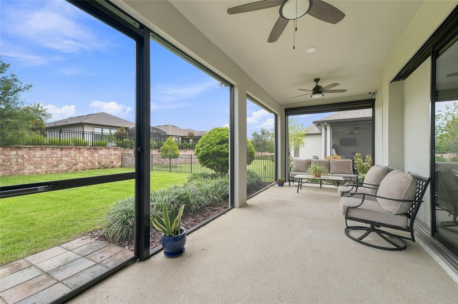 Expansive lanai to include motorized sun panels for added privacy & entertaining - 1334 ZEEK RIDGE ST, CLERMONT