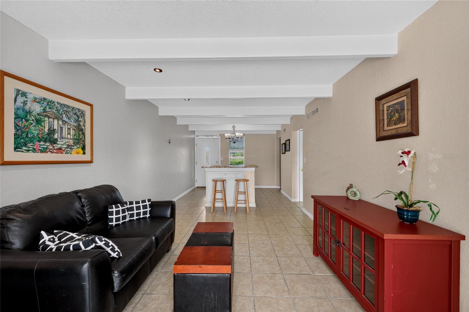 Looking from the living room to the dining area and the front door. - 4409 CLUB CIR, LAKE WALES