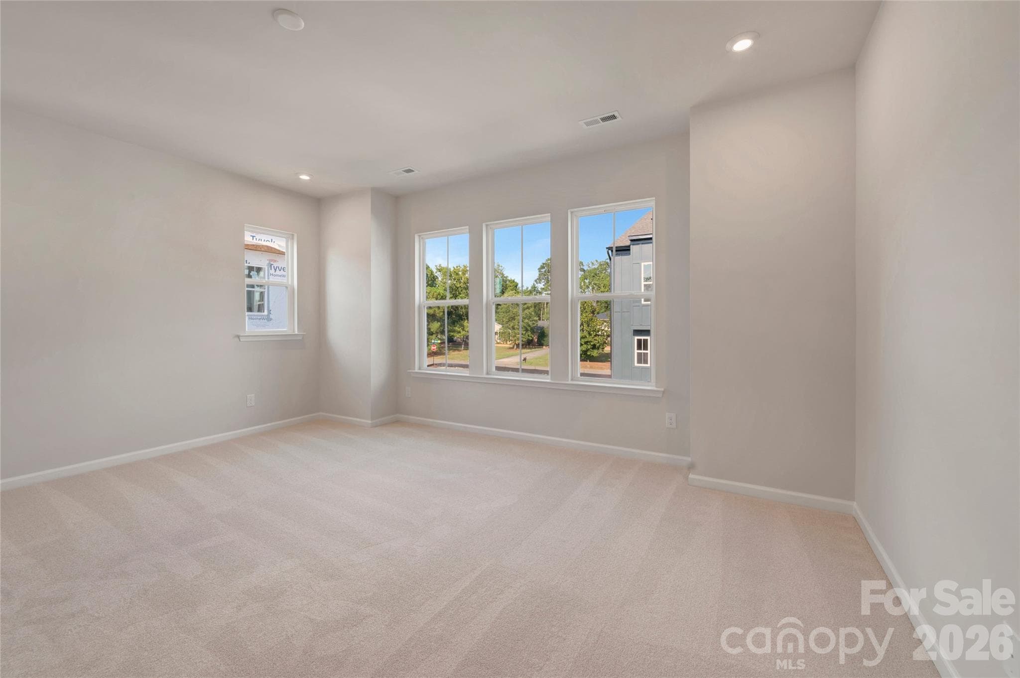 Primary Suite with ample natural light - Charlotte