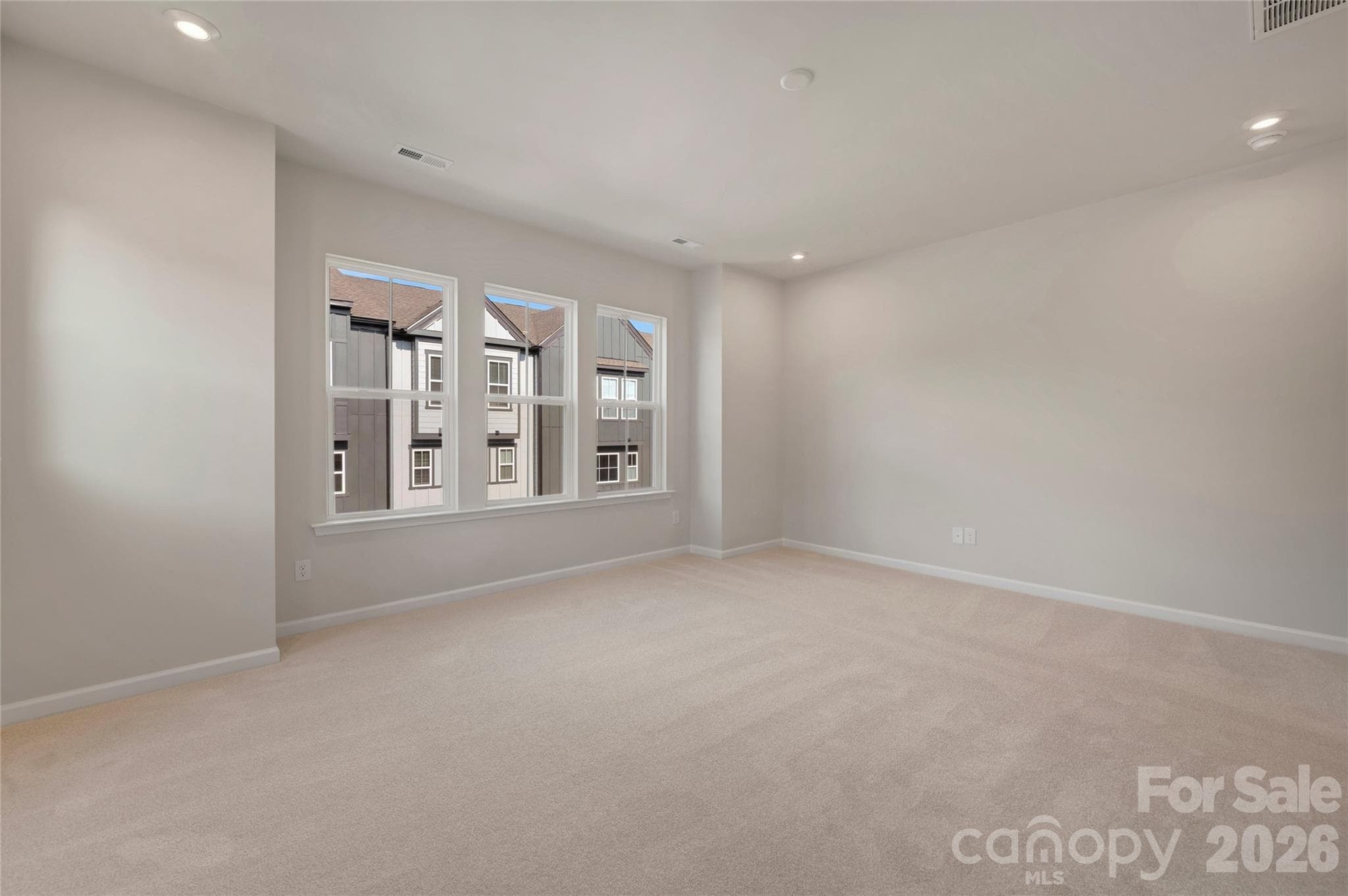 Primary Suite with ample natural light - Charlotte