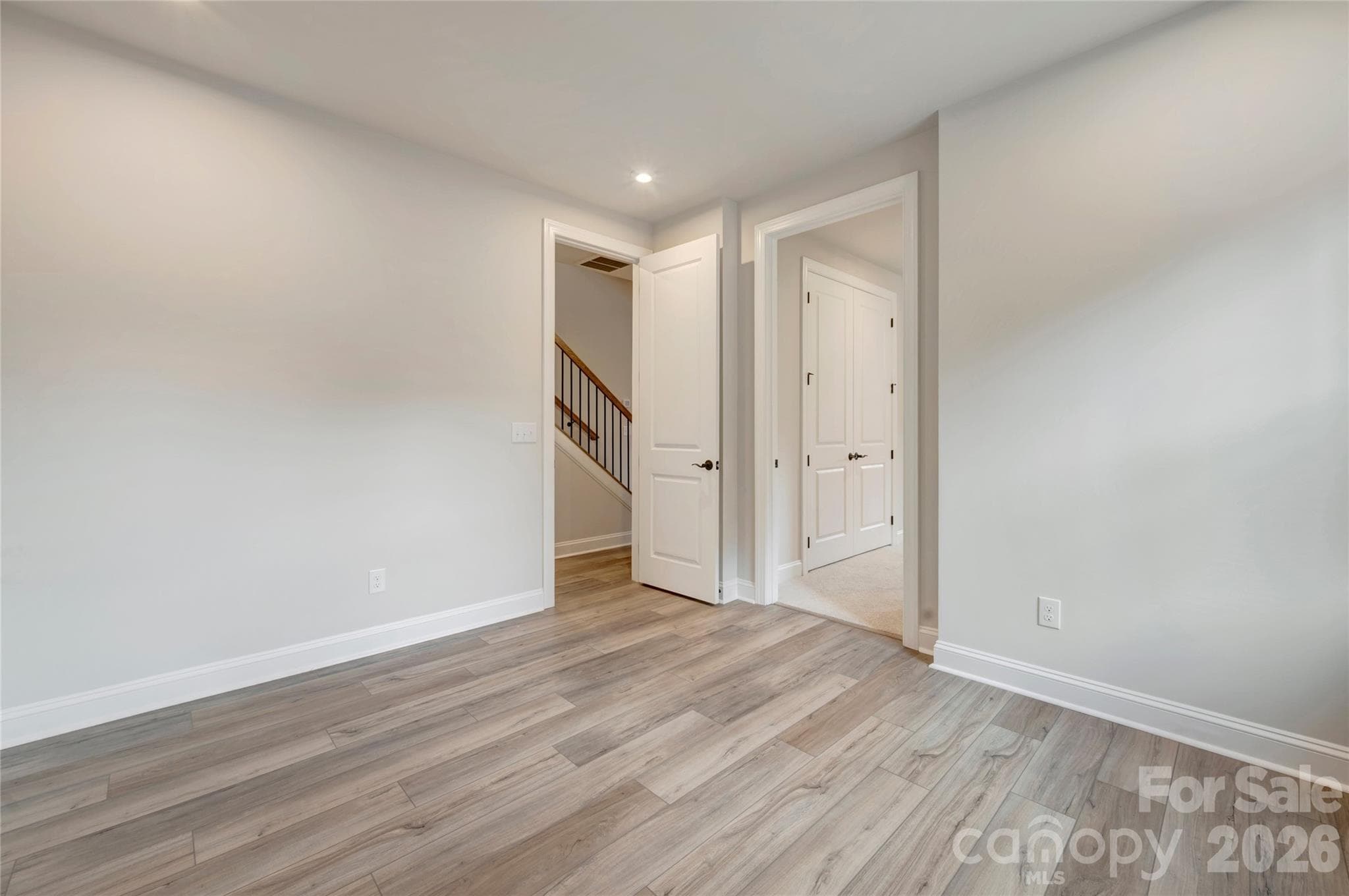 First floor GenSmart Suite living room - 13023 Lucy Park Lane, Charlotte