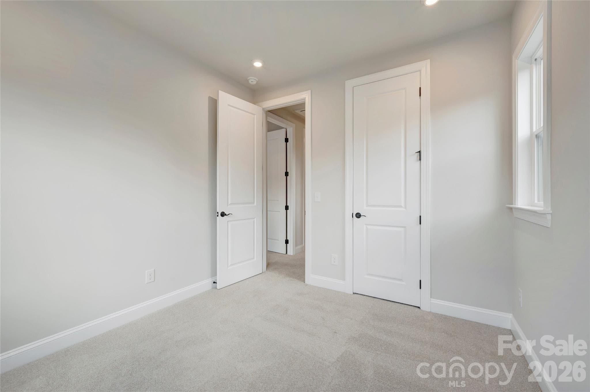 First floor GenSmart Suite bedroom - 13023 Lucy Park Lane, Charlotte
