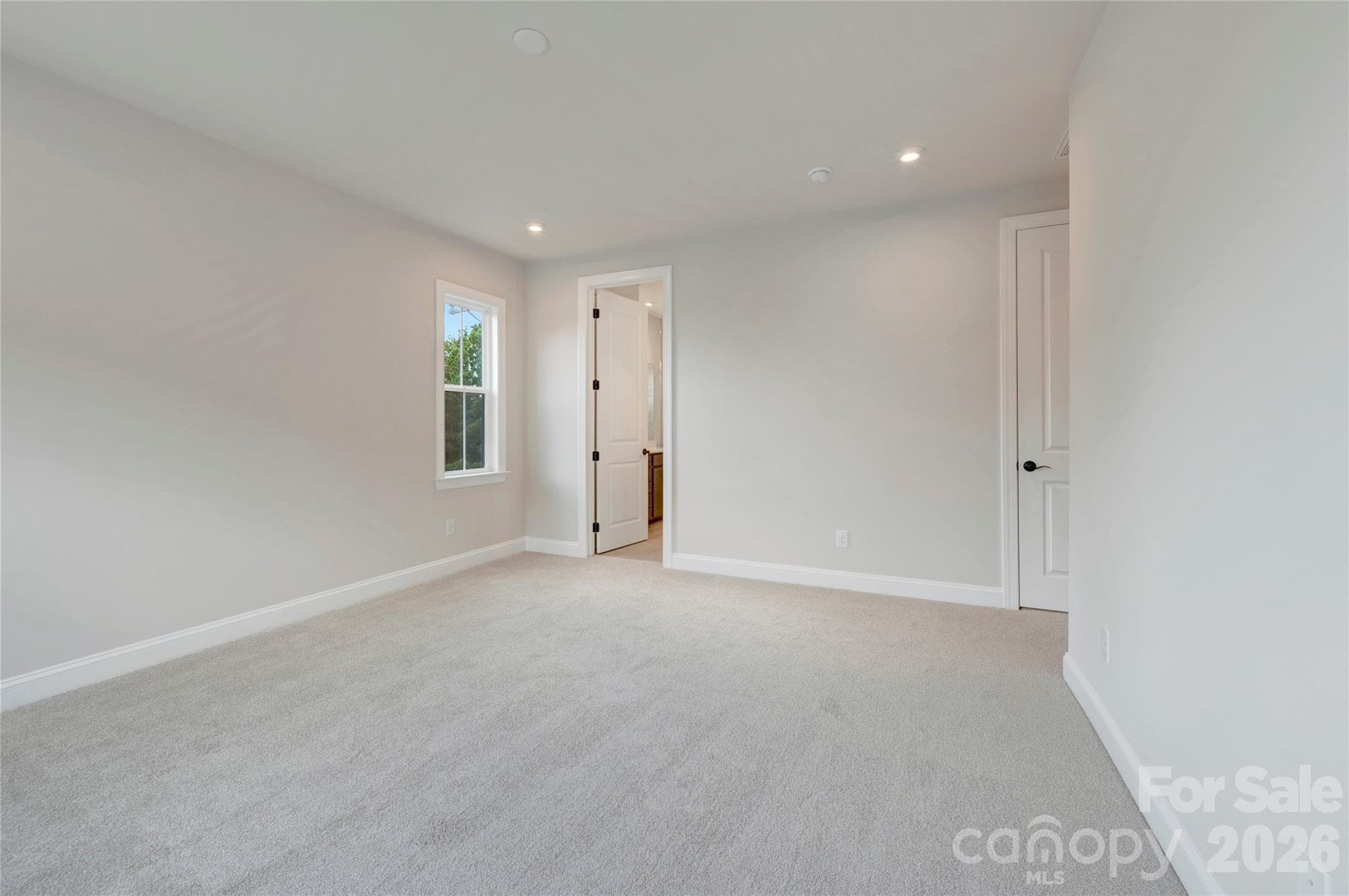 First floor GenSmart Suite bedroom - 13023 Lucy Park Lane, Charlotte