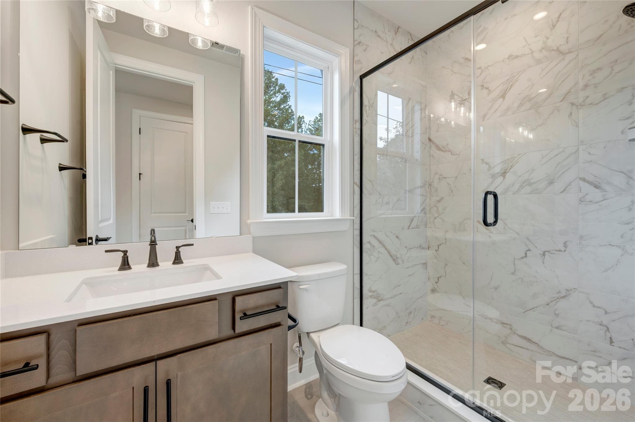 First floor GenSmart Suite bathroom with tiled walk-in shower - 13023 Lucy Park Lane, Charlotte