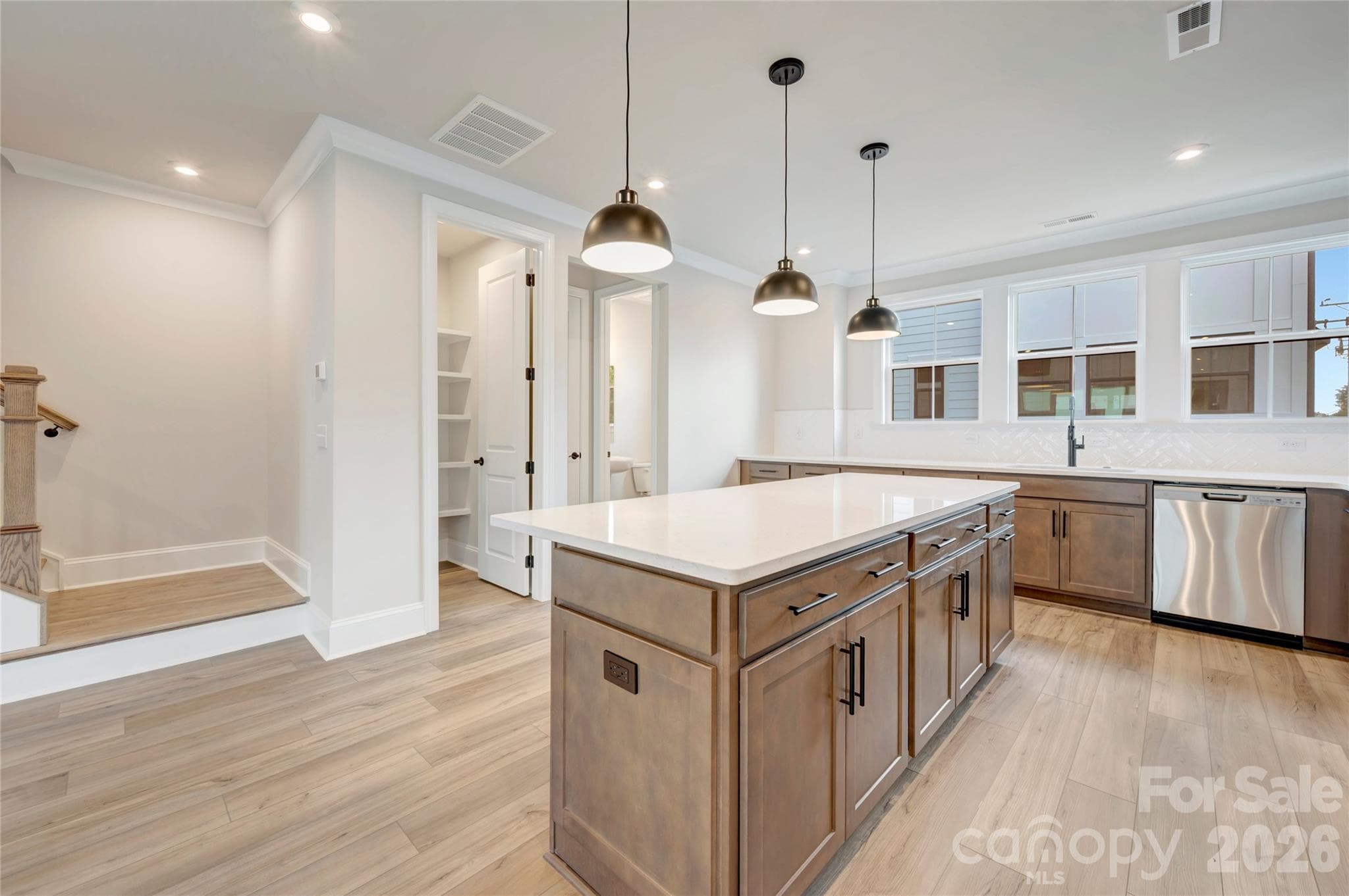 Gourmet kitchen with large windows for ample natural light - 13023 Lucy Park Lane, Charlotte