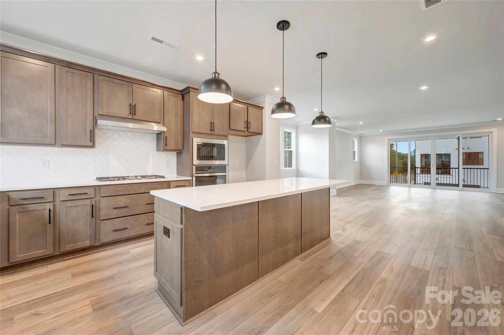 Gourmet kitchen with a gas cooktop - 13023 Lucy Park Lane, Charlotte
