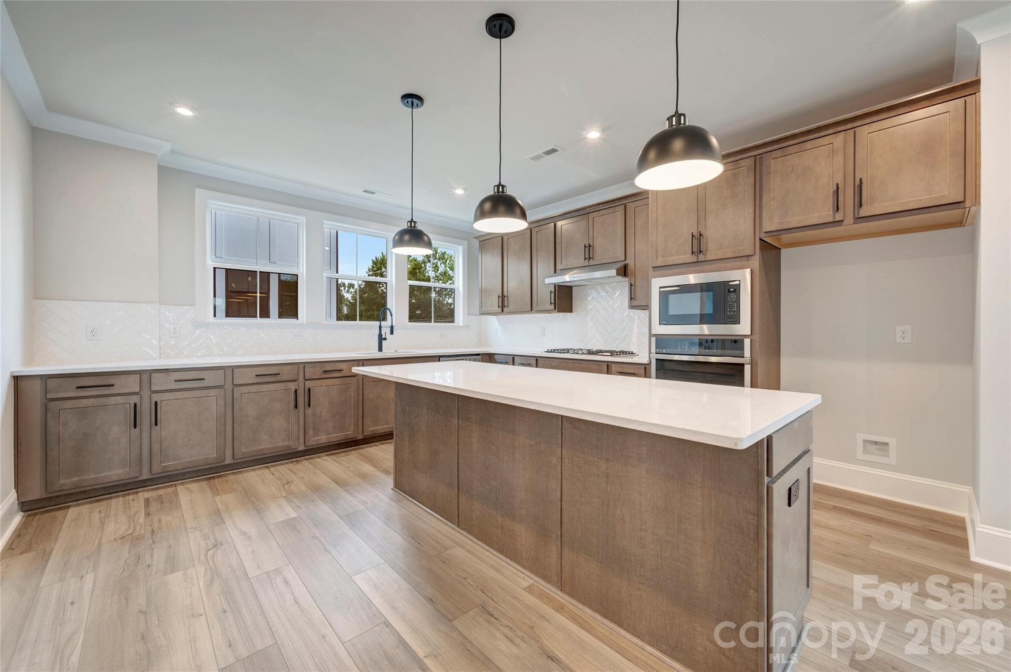 Large kitchen island and ample countertop space - 13023 Lucy Park Lane, Charlotte