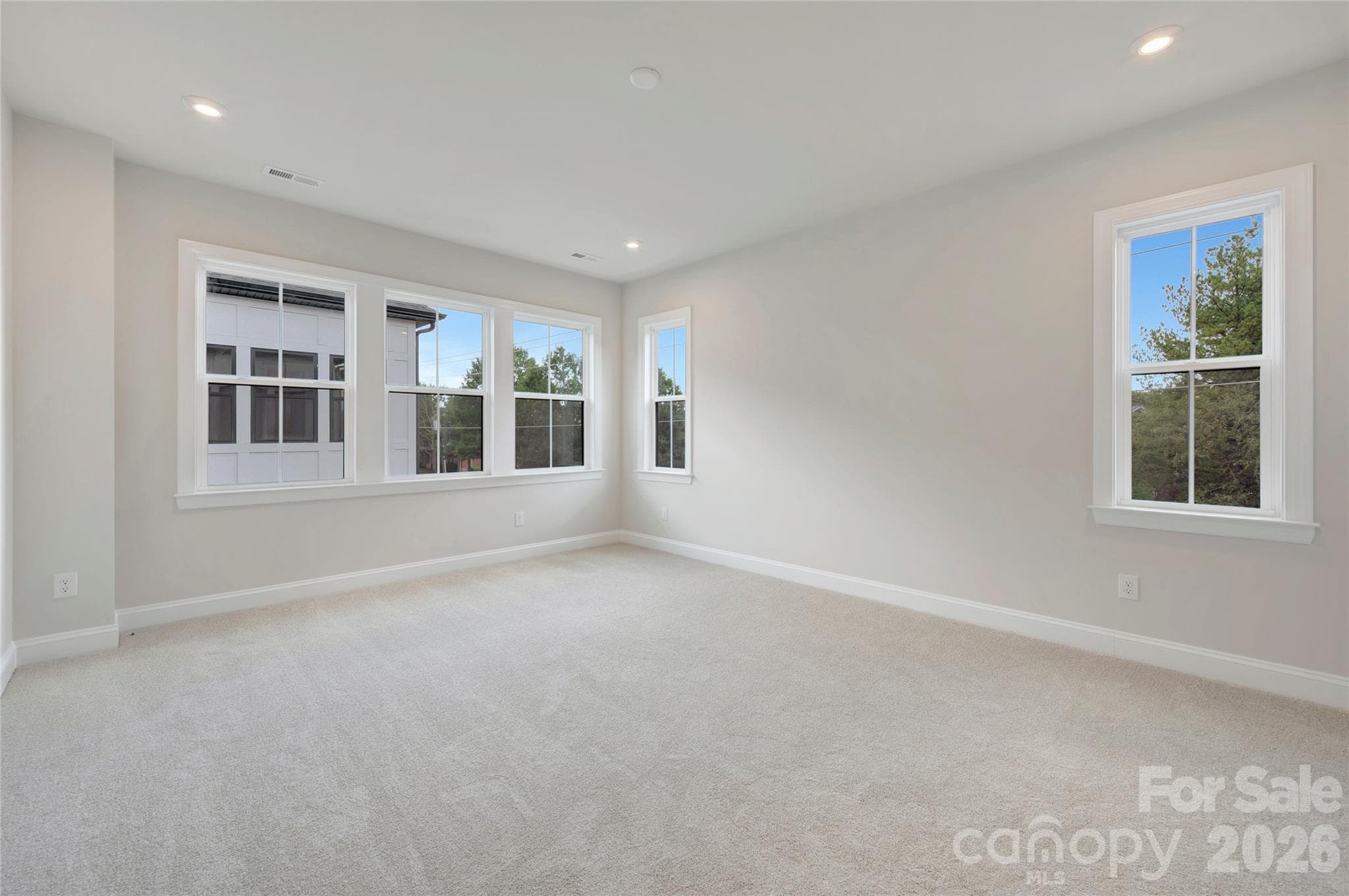Light filled primary bedroom - 13023 Lucy Park Lane, Charlotte