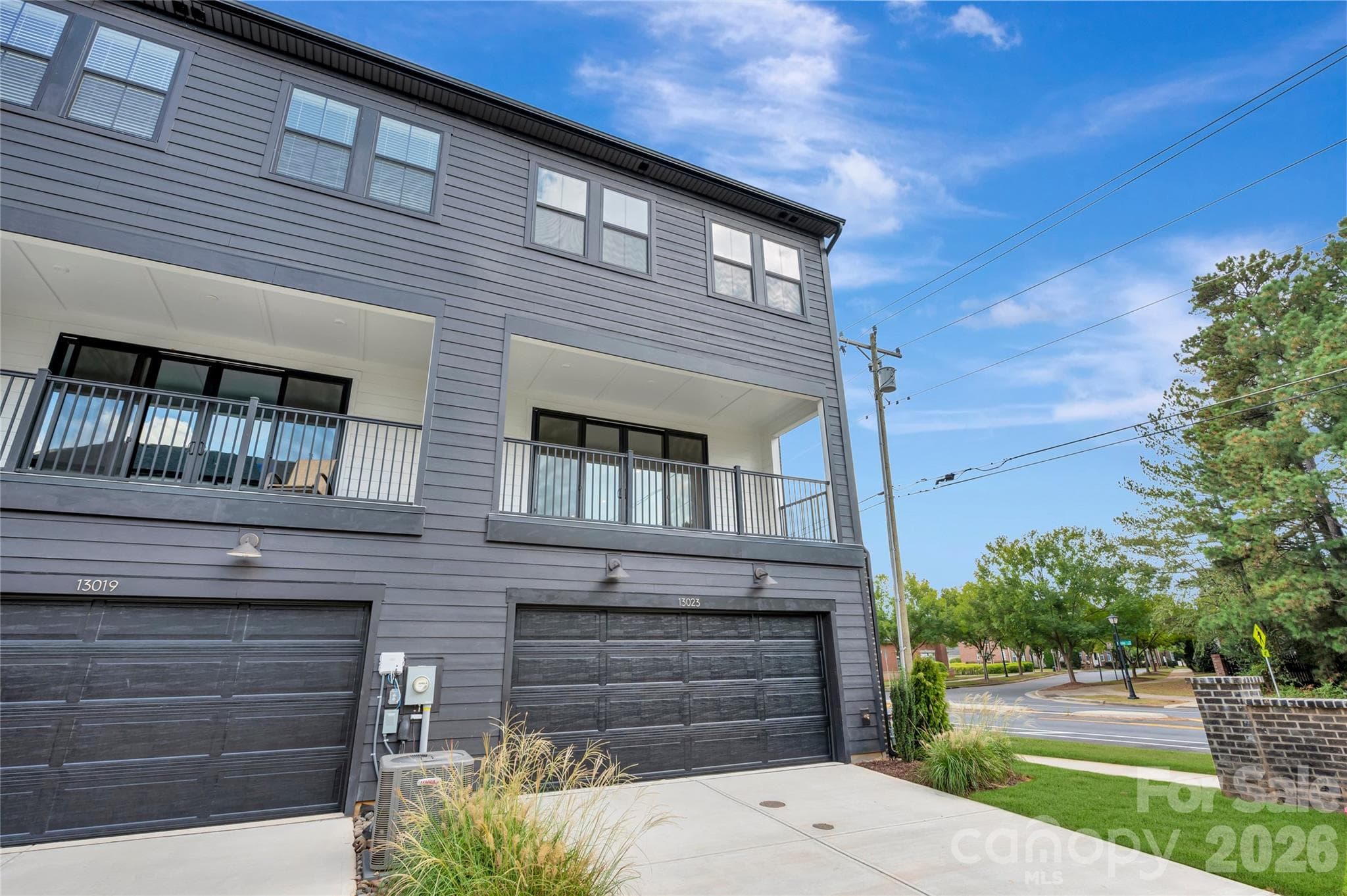 Rear load 2 bay garage and covered outdoor living space - 13023 Lucy Park Lane, Charlotte
