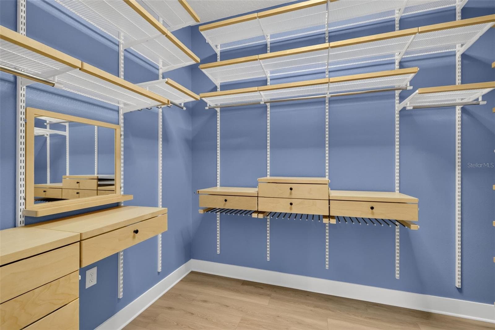 Primary Bedroom Customized Walk-In Closet - 7778 BRIAN ETHEREDGE WAY, THE VILLAGES