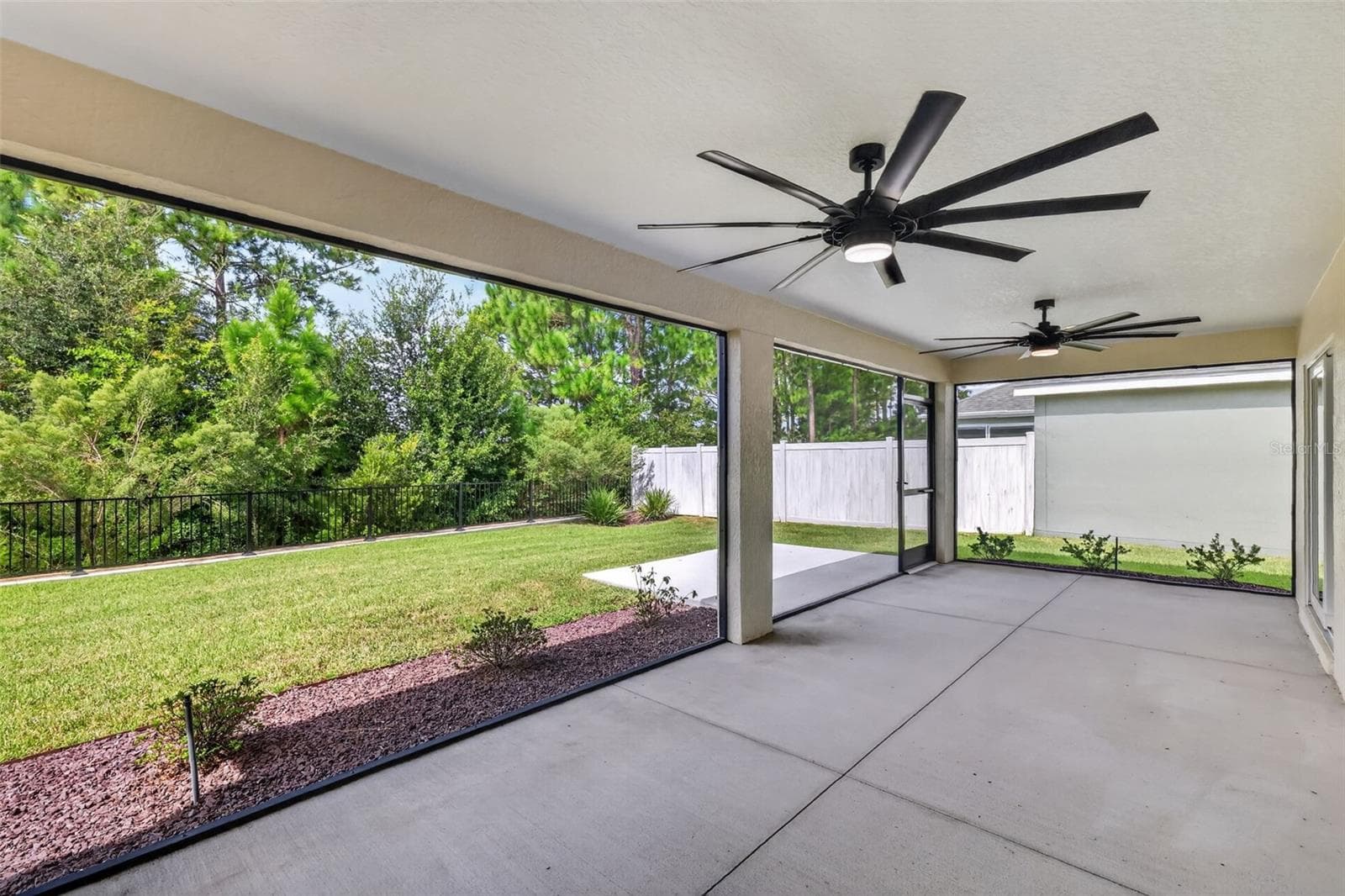 Expansive 28'x11' Lanai with Serene Eagle Preserve Views and PRIVACY Fencing - 7778 BRIAN ETHEREDGE WAY, THE VILLAGES