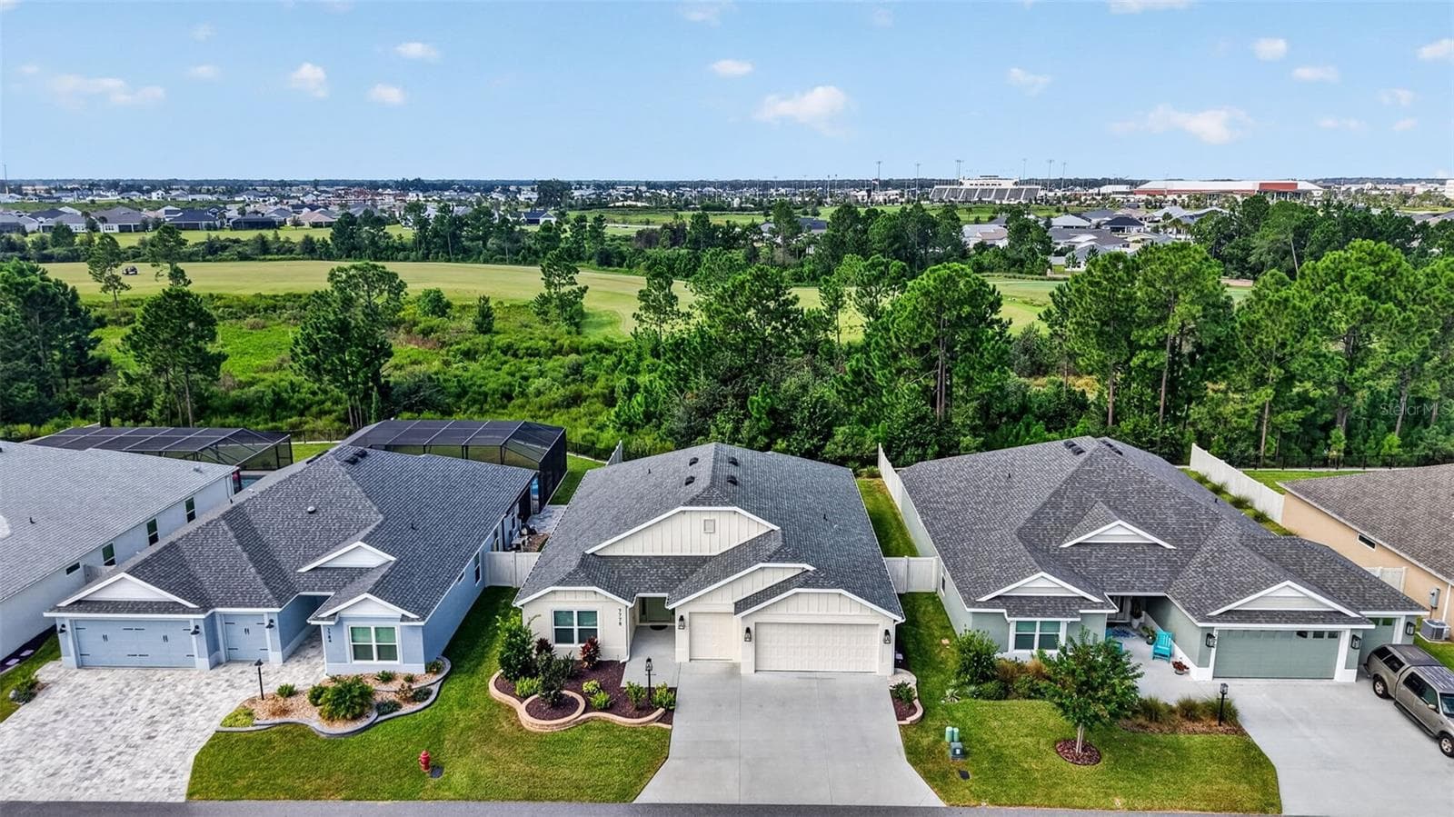 Aerial Front Elevation with Sweeping Eagle Preserve and Partial Shallow Creek Golf Course Views! - 7778 BRIAN ETHEREDGE WAY, THE VILLAGES
