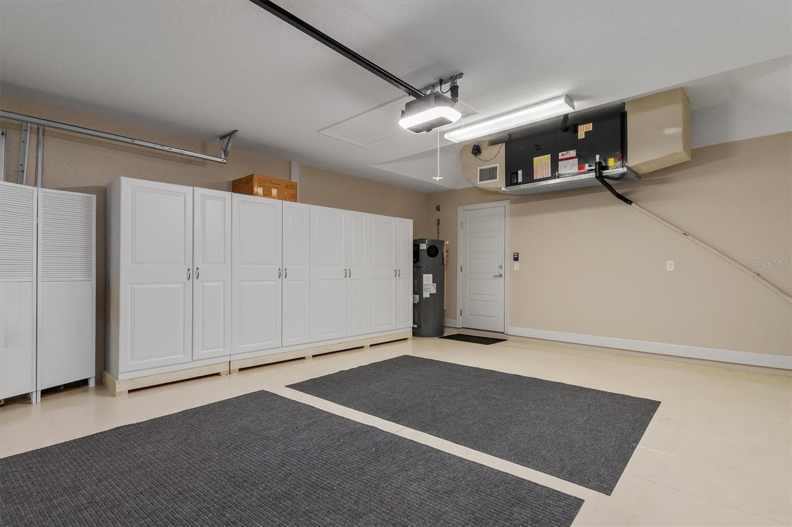 Air conditioner and extra storage in your garage - 2420 SHEILA LN, NORTH PORT