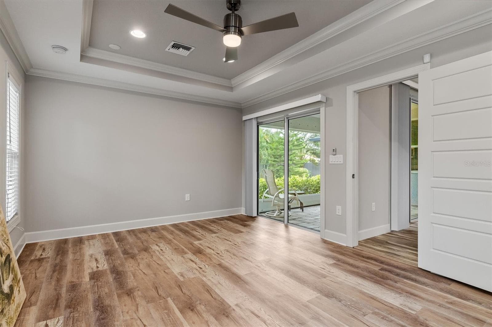 Primary bedroom with access to lanai - 2420 SHEILA LN, NORTH PORT
