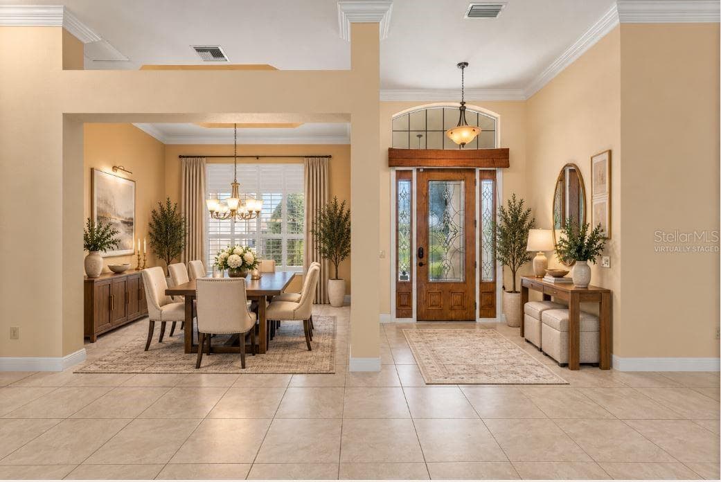 Virtually staged formal dining room. - 1126 MIONA SHORES DR, THE VILLAGES